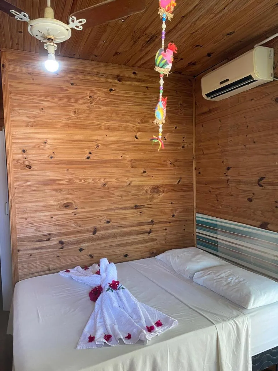 Bed in Pousada Casa de Madeira