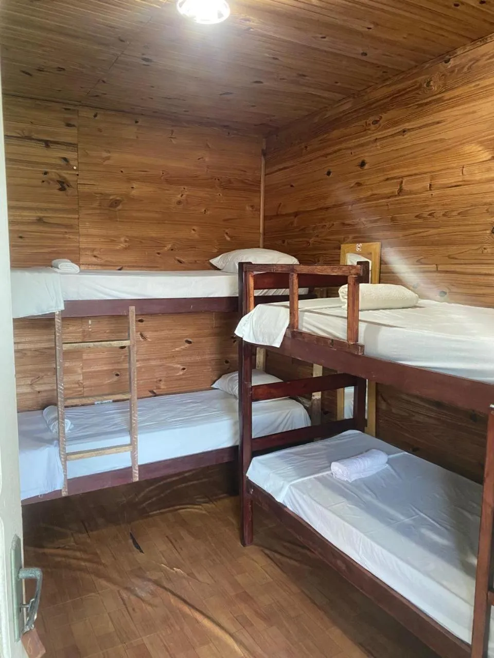 Bed in Pousada Casa de Madeira