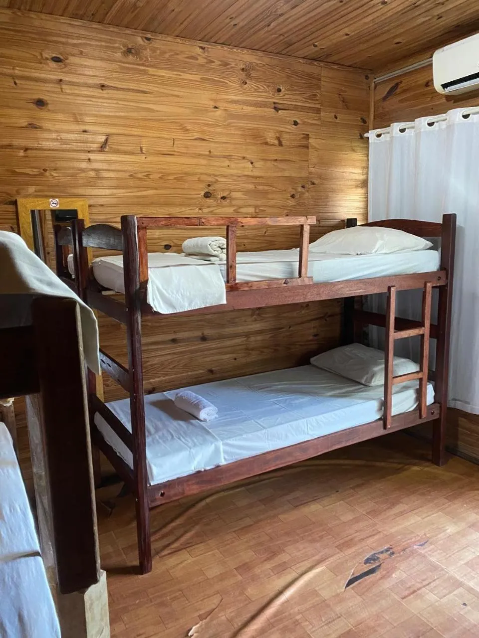 Bed in Pousada Casa de Madeira