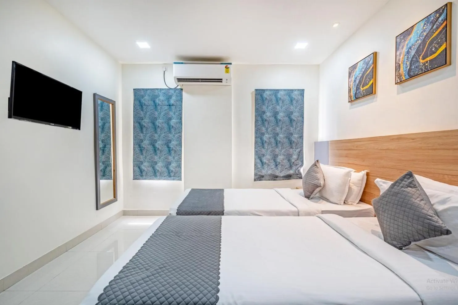 Bed in Eminent Suites and Apartments