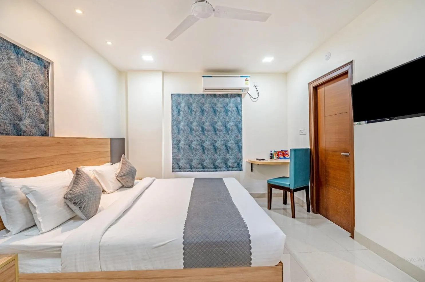 Bed in Eminent Suites and Apartments