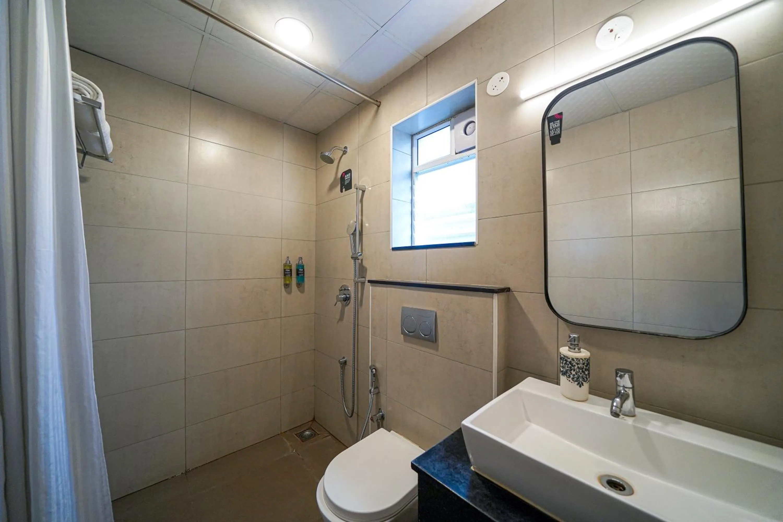 Shower in Olive Hotel Indiranagar 100Ft Road by Embassy Group