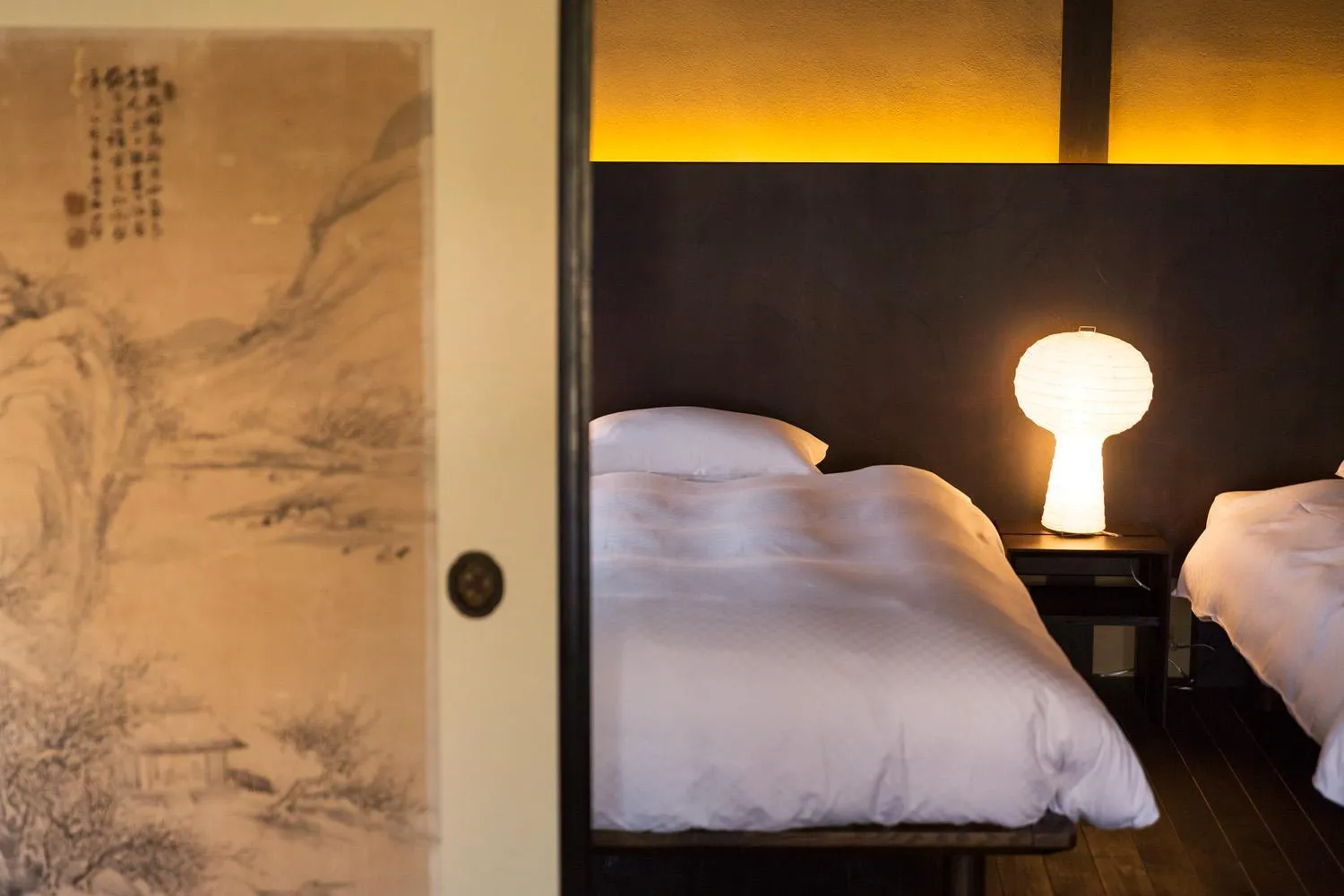 Bed in EN Takeda Castle Town Hotel