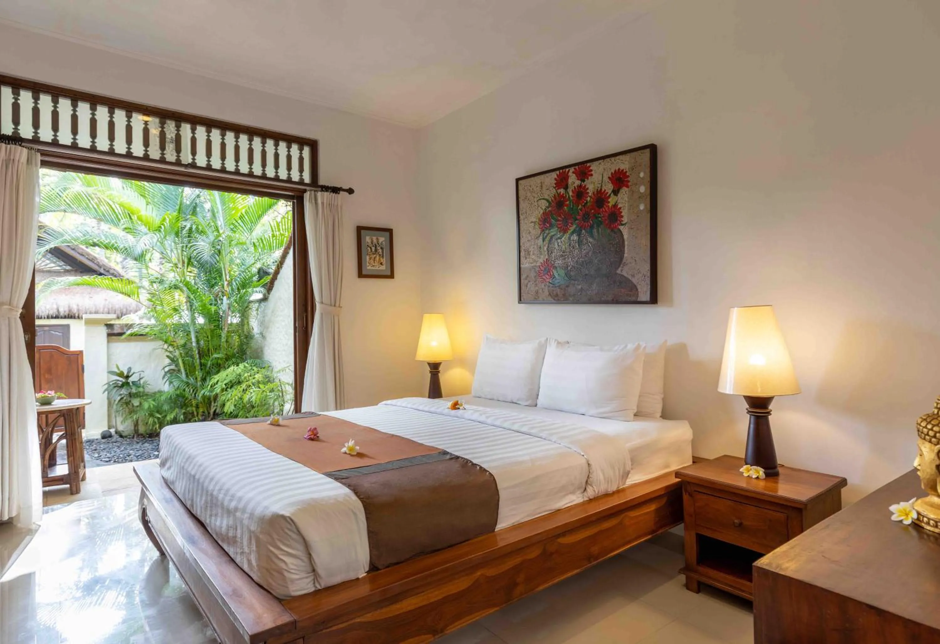 Bed in Alam Anda Ocean Front Resort & Spa Dive Resort