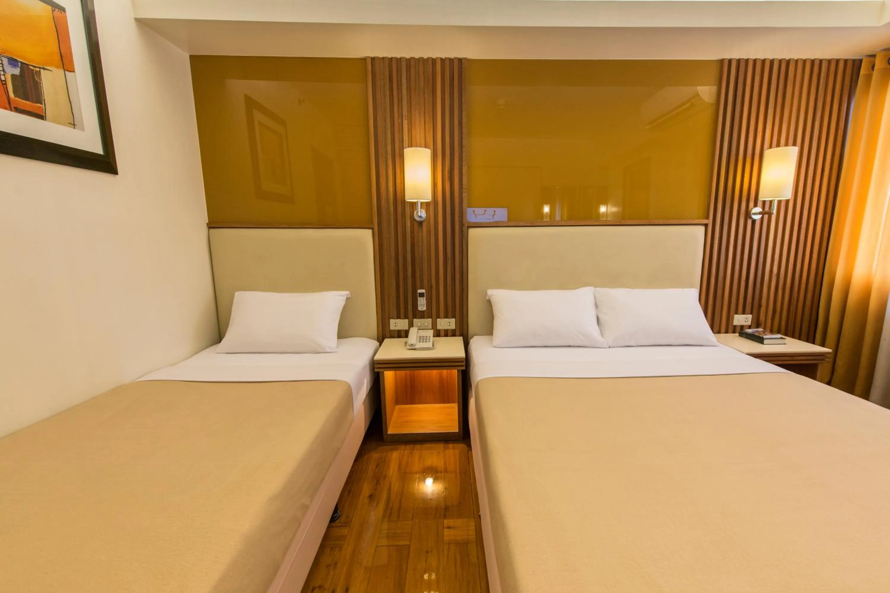 Bedroom, Bed in Kabayan Hotel Pasay
