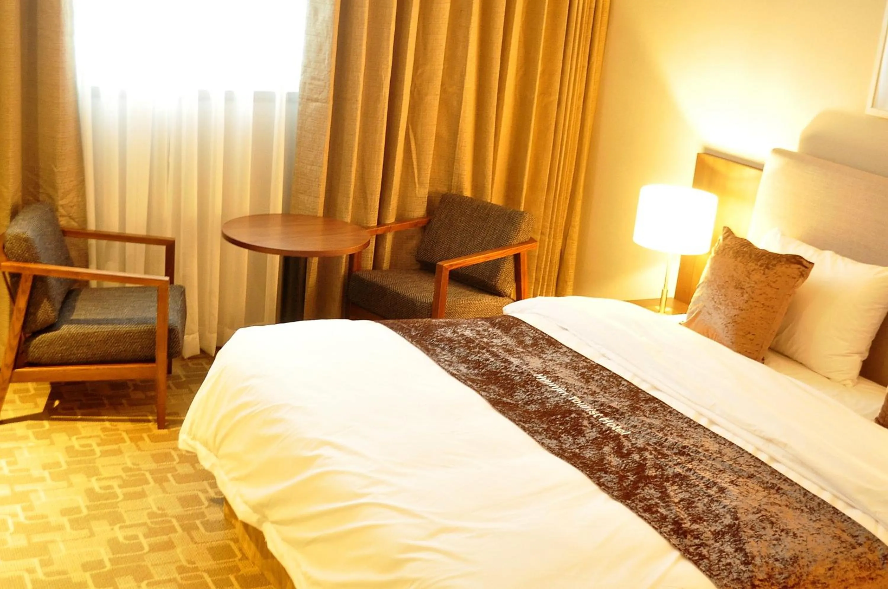 Photo of the whole room, Bed in Hyunjin Tourist Hotel