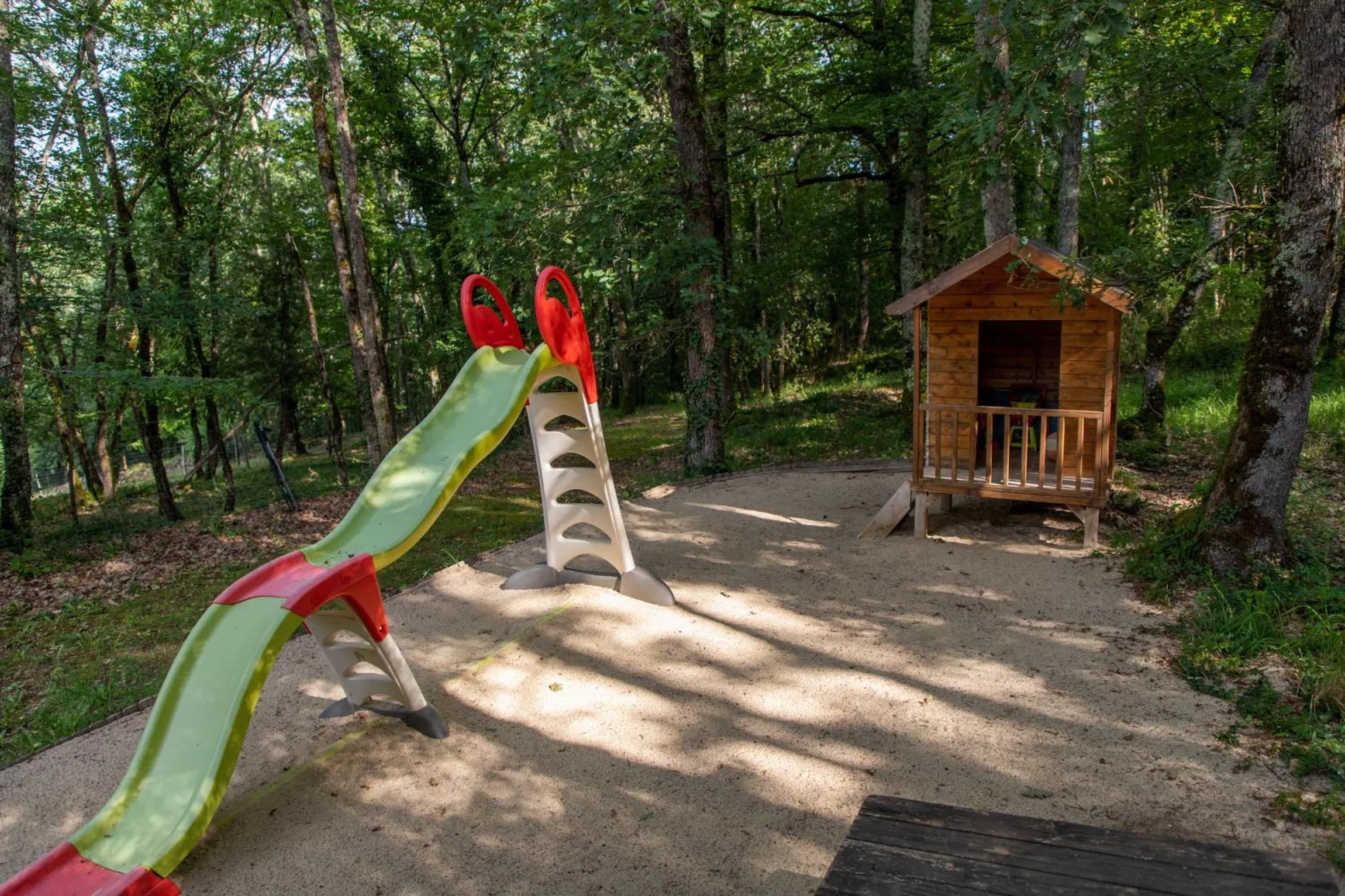 Children play ground in Chambres d'hôtes avec Piscine la Rossillonie
