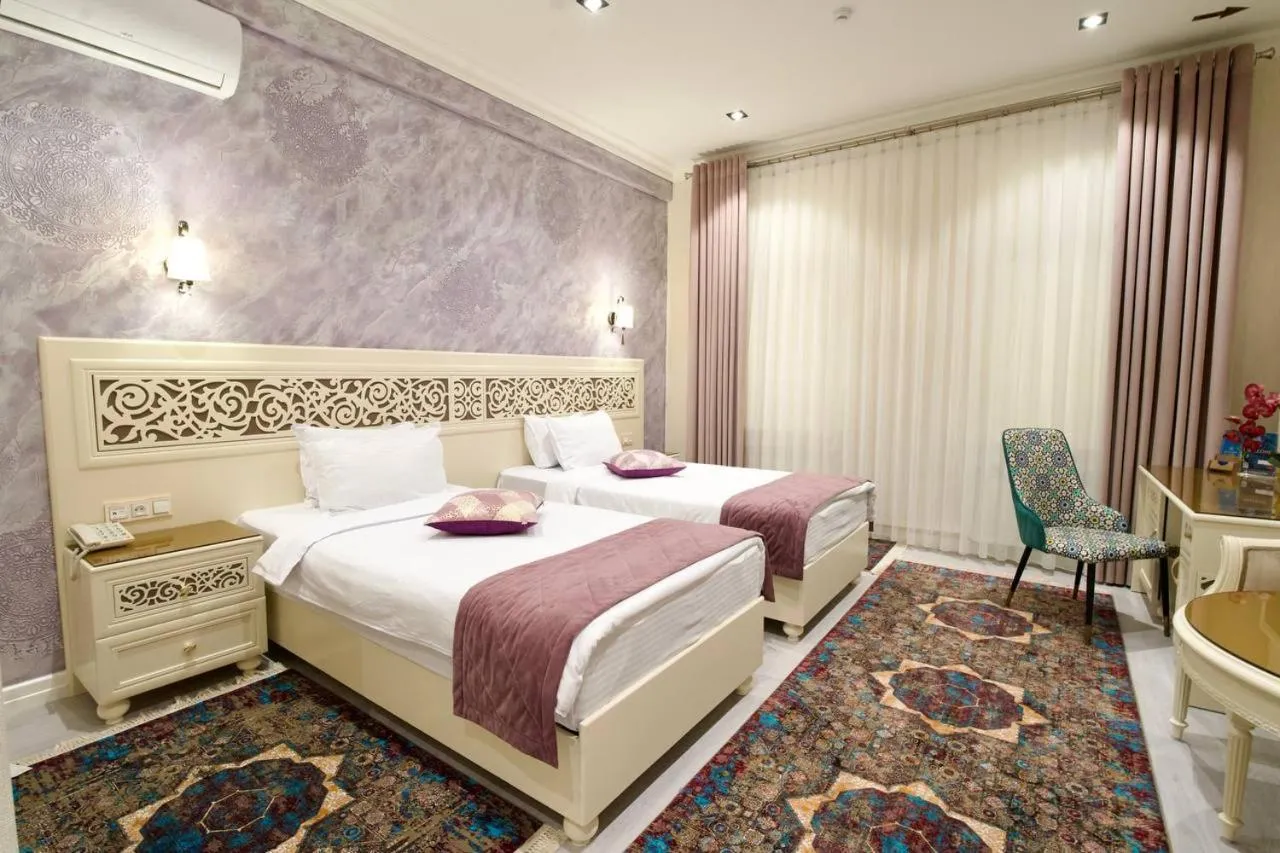 Bed in HOTEL SILK ROAD EMPIRE SAMARKAND