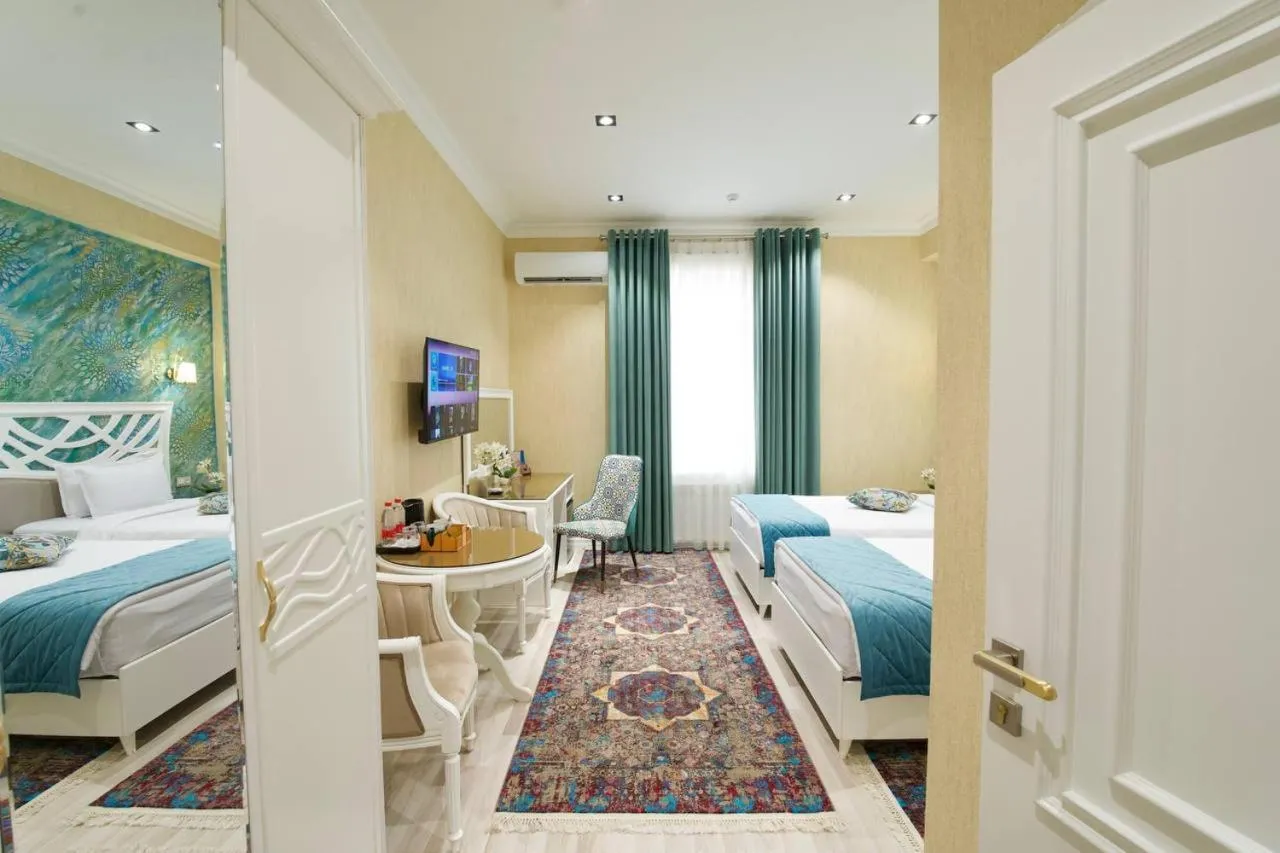 Bed in HOTEL SILK ROAD EMPIRE SAMARKAND