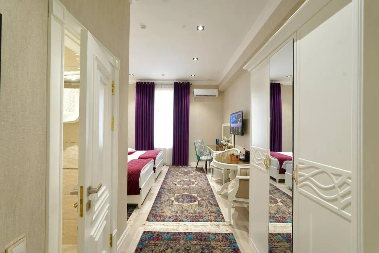 Bed in HOTEL SILK ROAD EMPIRE SAMARKAND