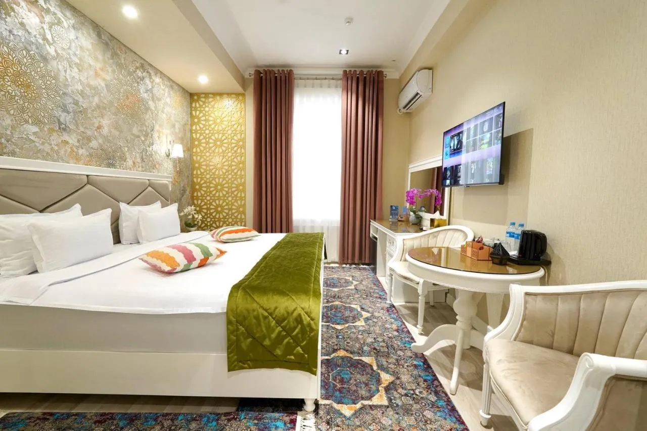 Bed in HOTEL SILK ROAD EMPIRE SAMARKAND