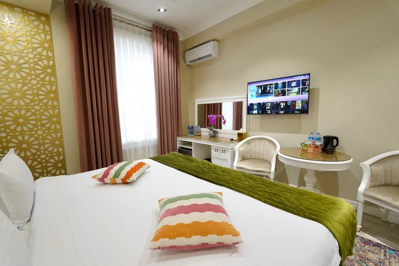 Bed in HOTEL SILK ROAD EMPIRE SAMARKAND