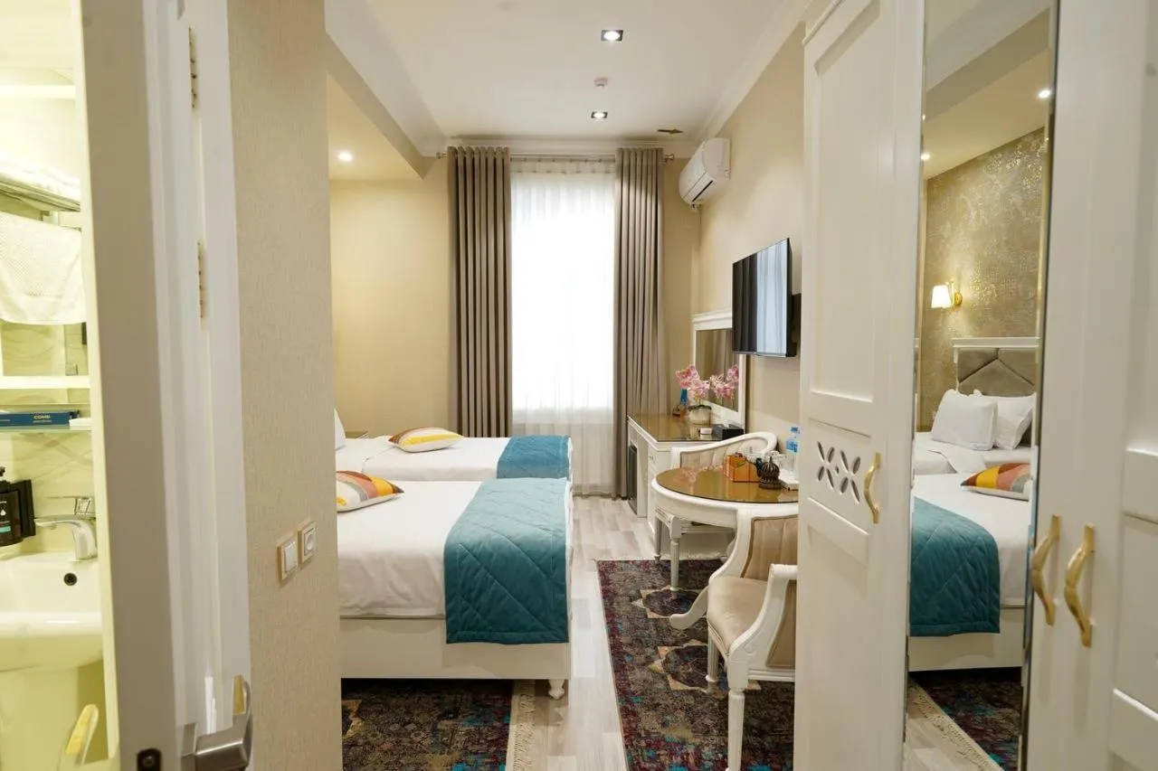 Bed in HOTEL SILK ROAD EMPIRE SAMARKAND