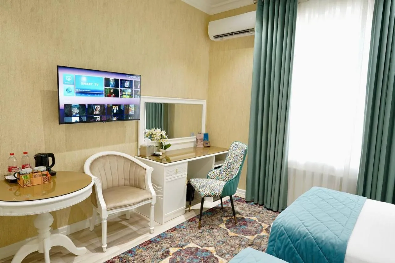 Bed in HOTEL SILK ROAD EMPIRE SAMARKAND