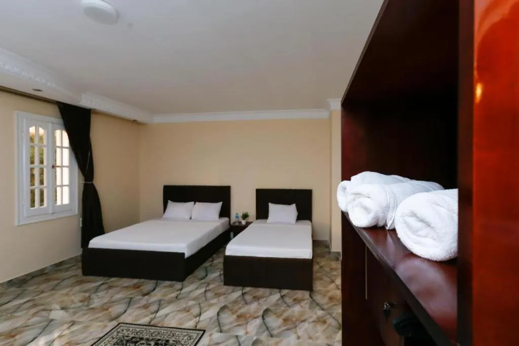 Bed in Turquoise Pyramids palace