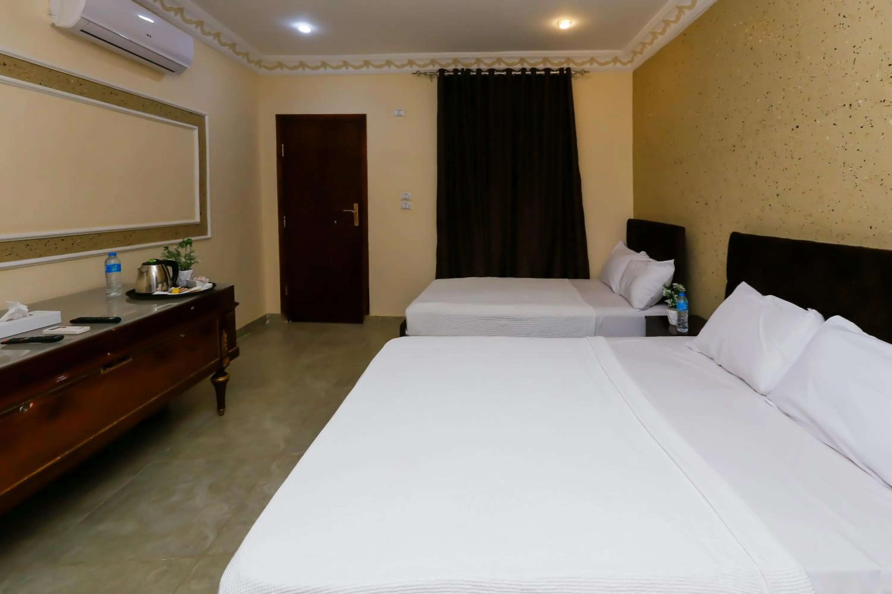 Bed in Turquoise Pyramids palace