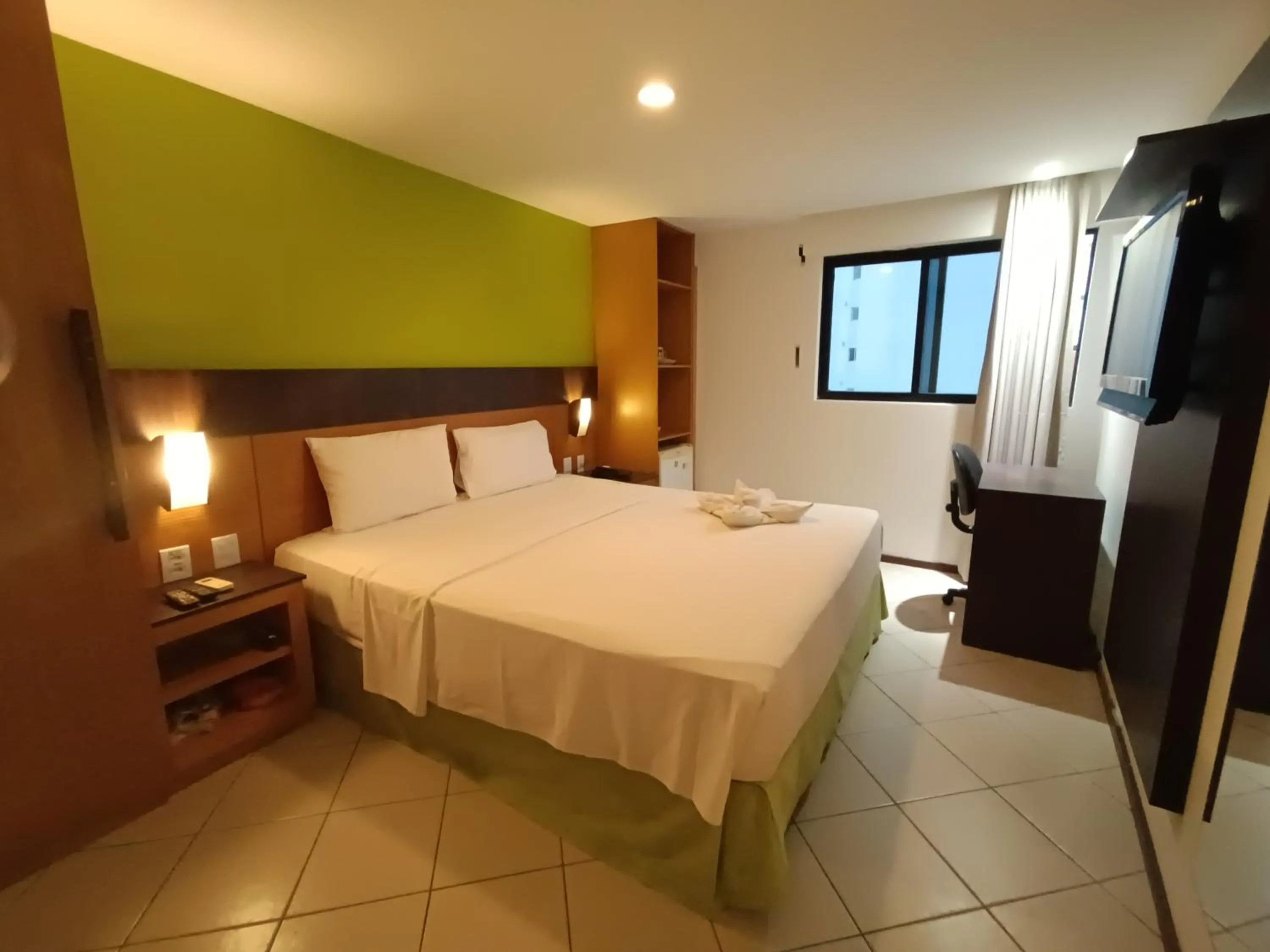 Bed in Suíte acolhedora em Hotel