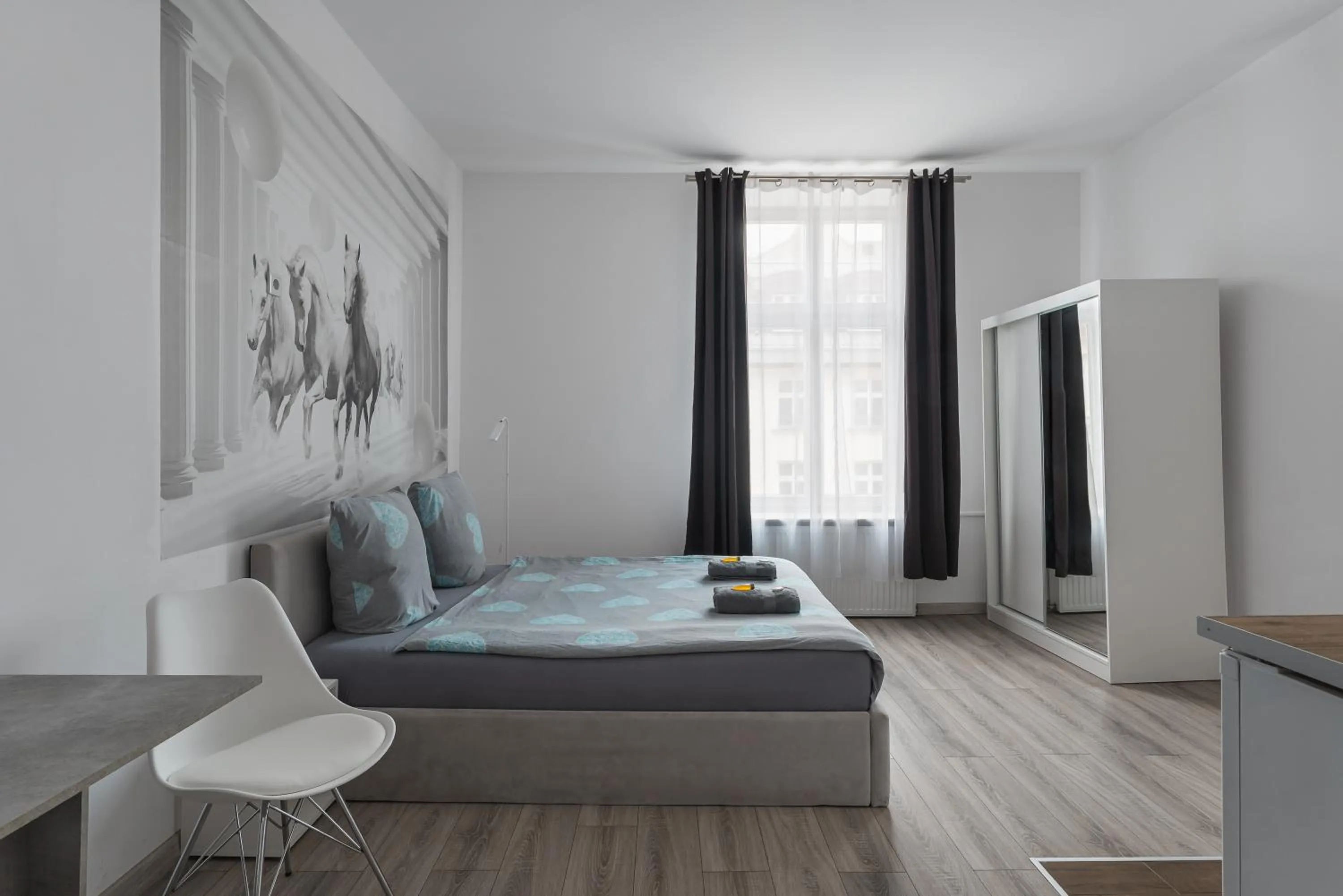 Bed in Queen Apartments