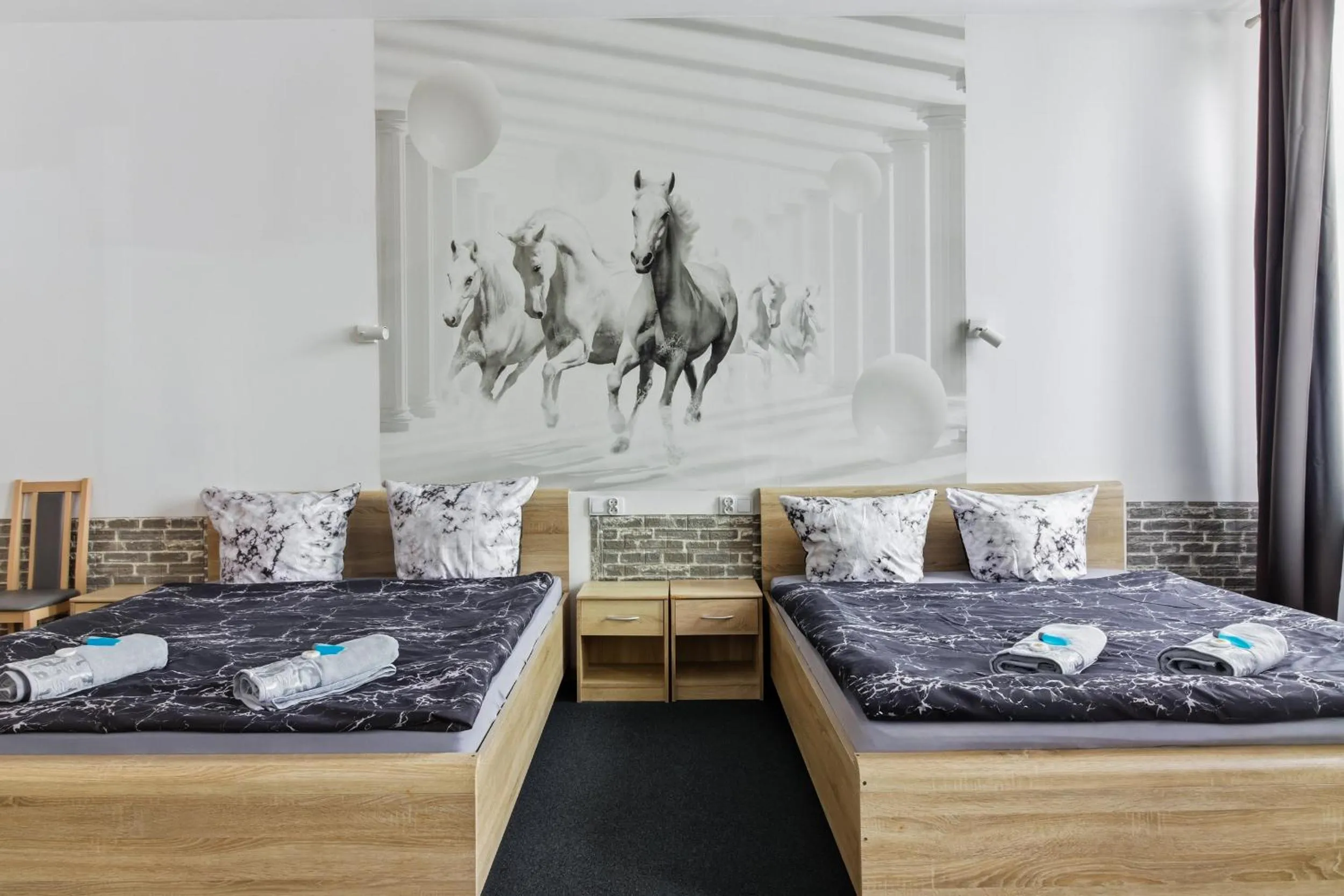 Bed in Queen Apartments