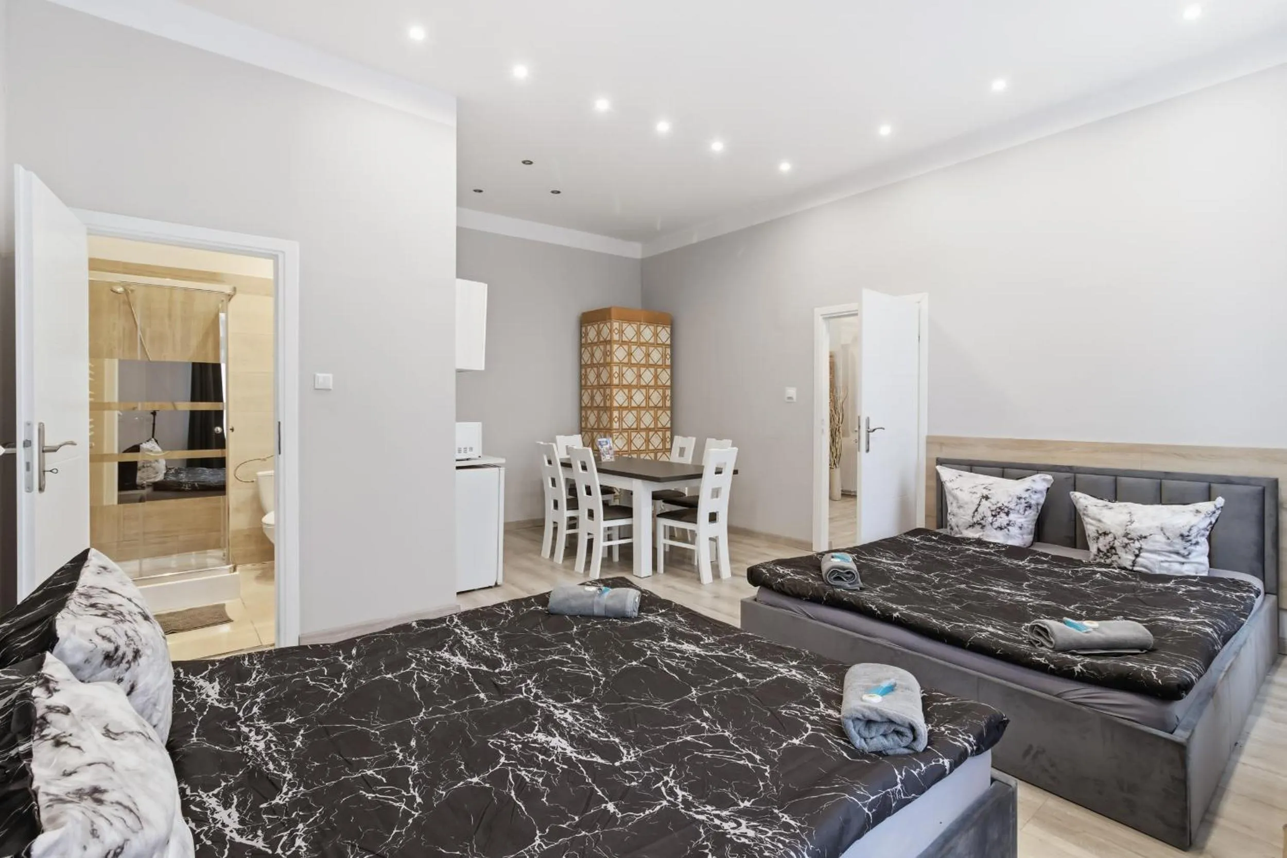 Bed in Queen Apartments