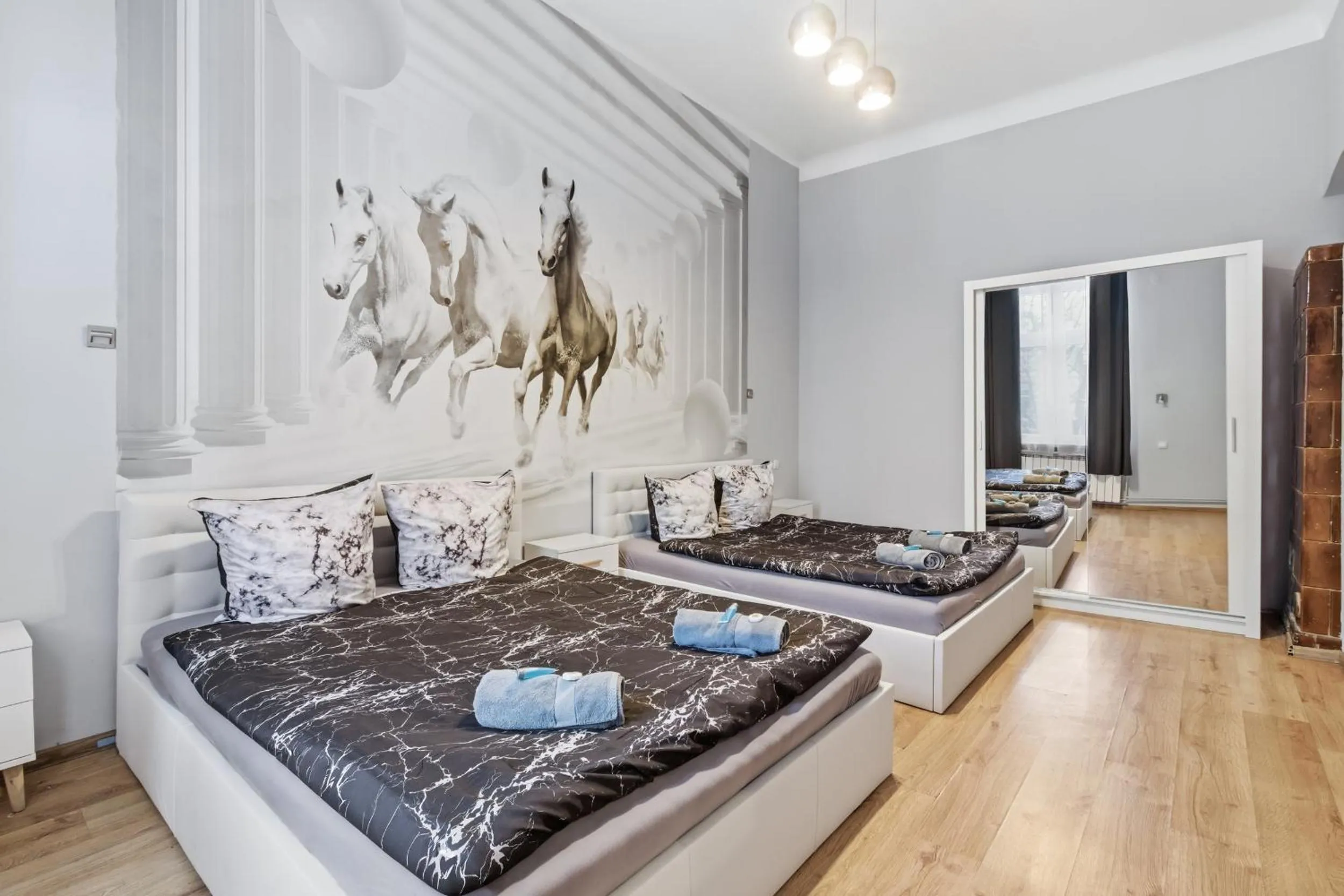 Bed in Queen Apartments