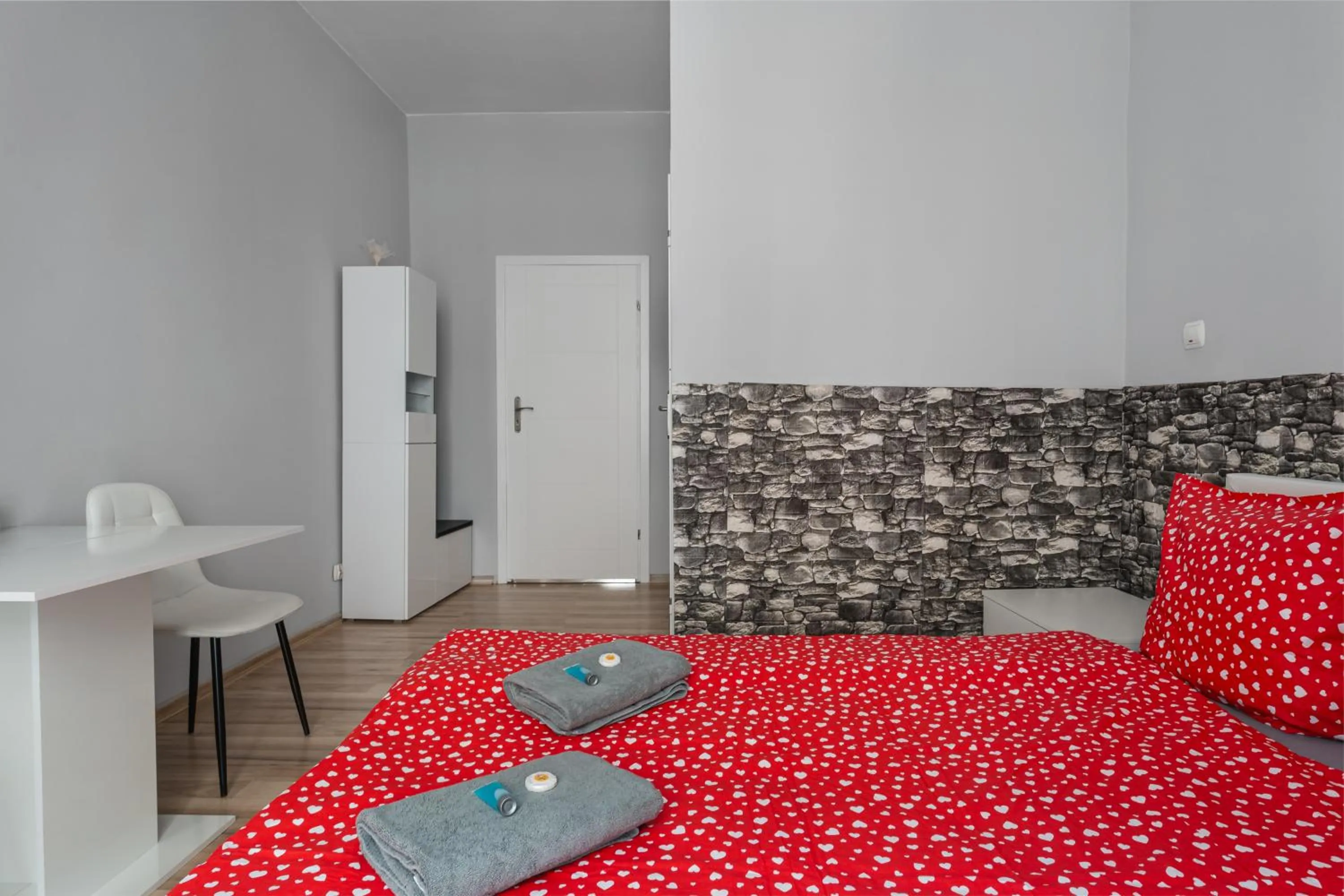 Bed in Queen Apartments