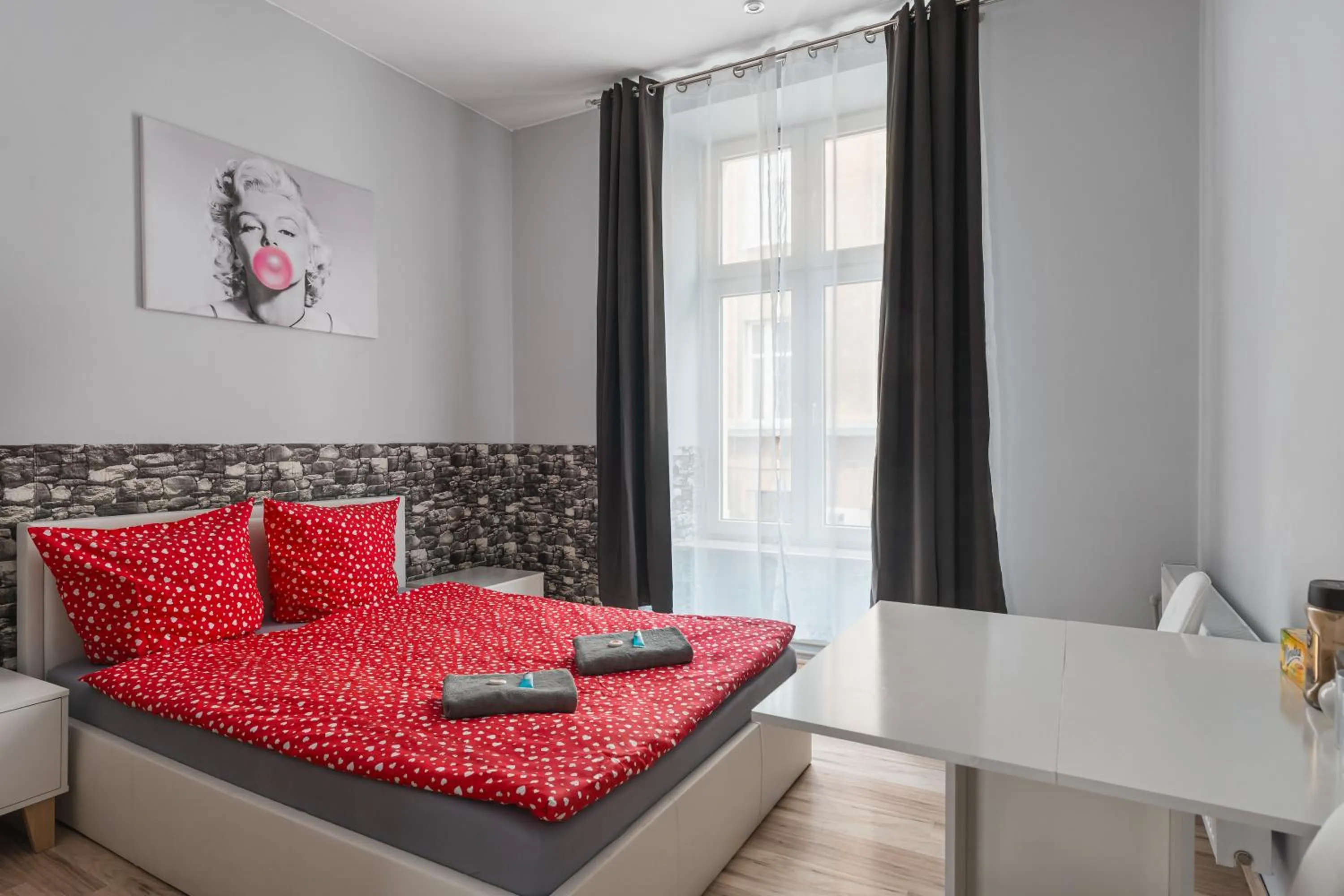 Bed in Queen Apartments