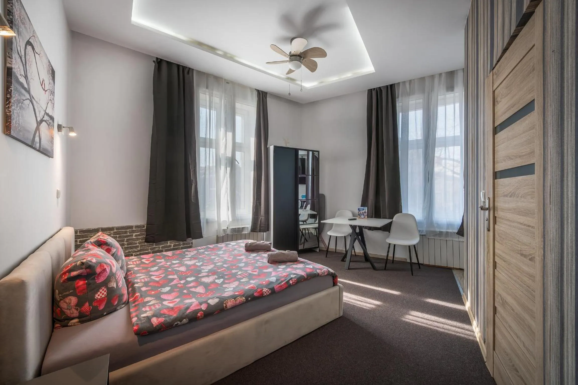 Bed in Queen Apartments