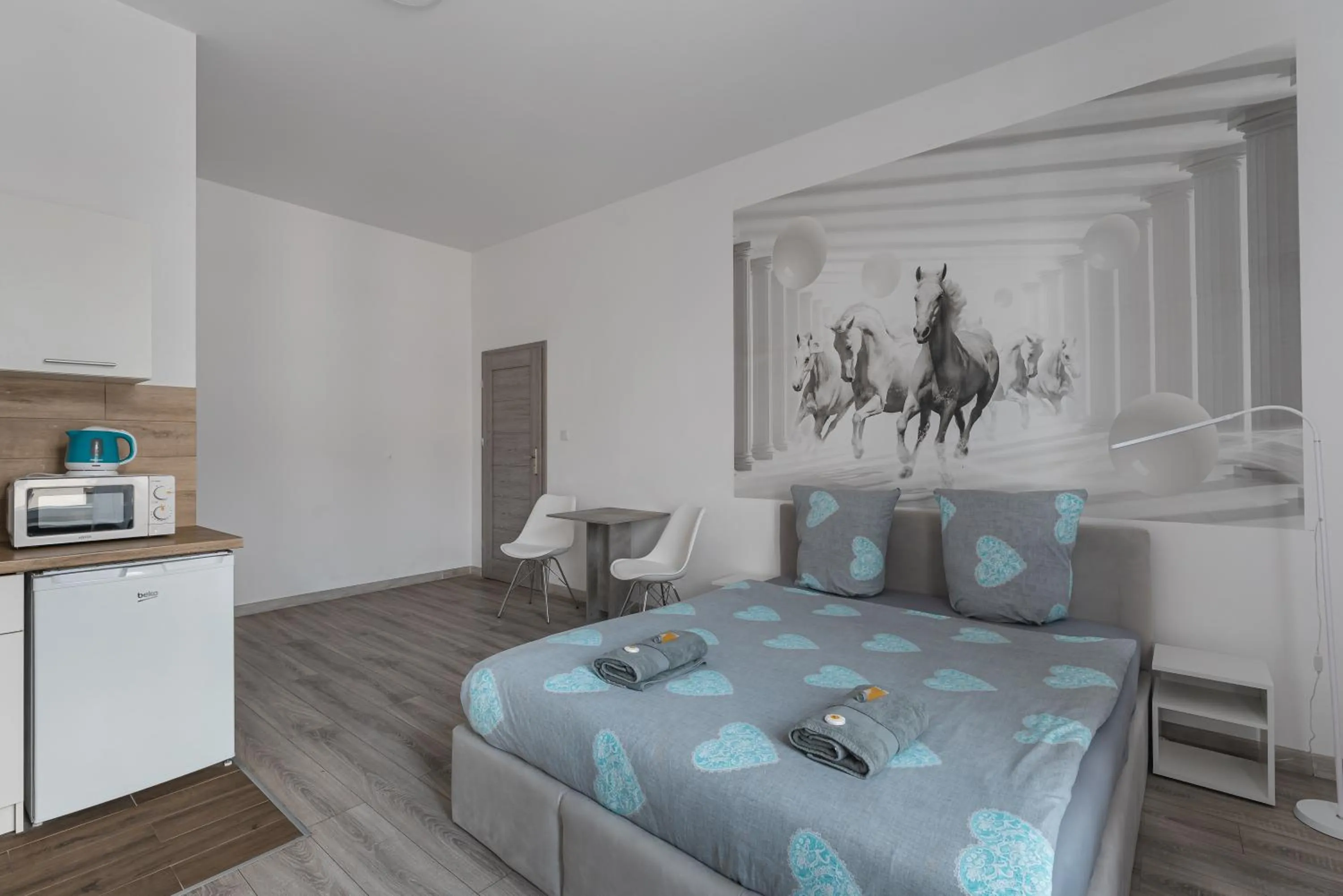 Bed in Queen Apartments