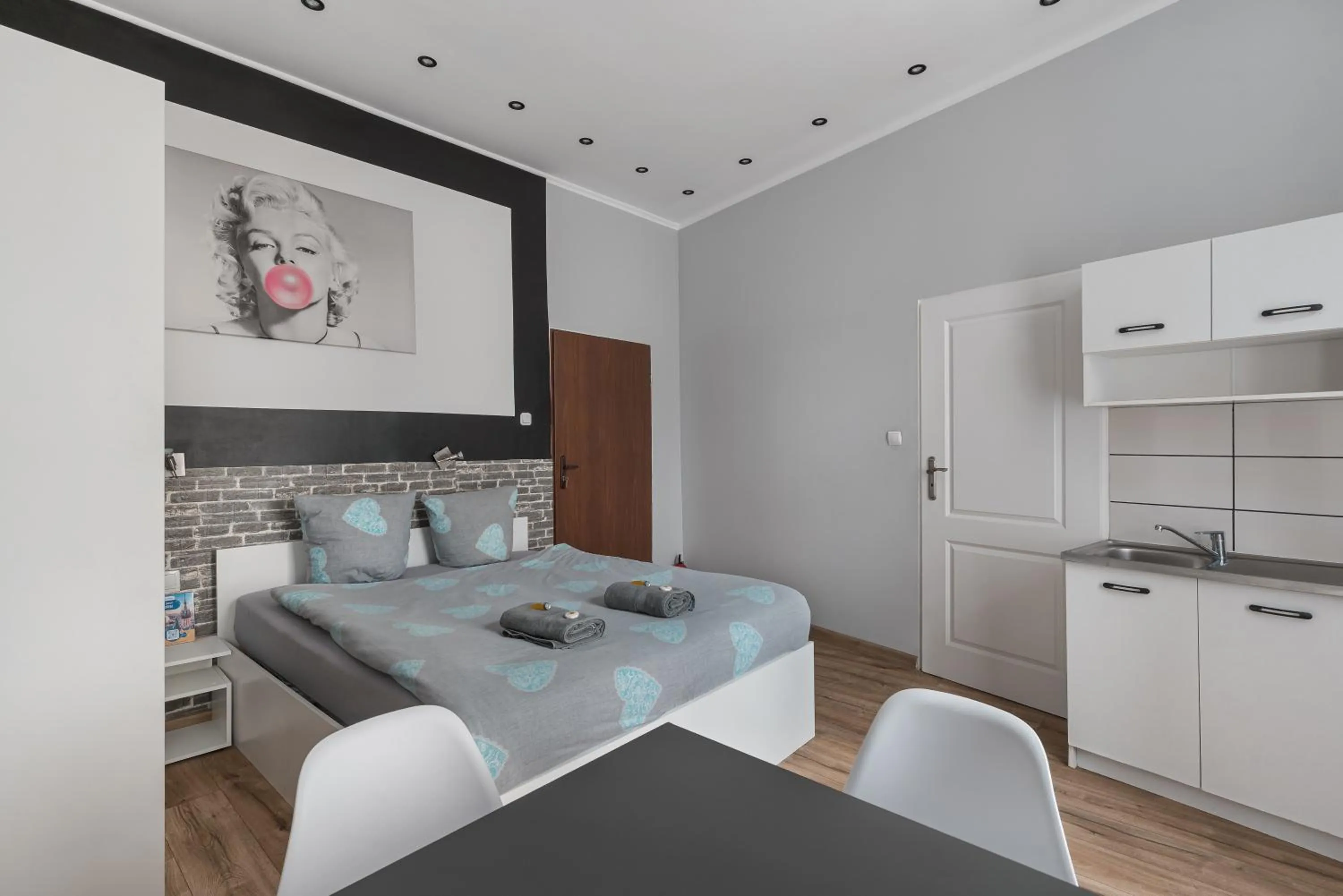 Bed in Queen Apartments