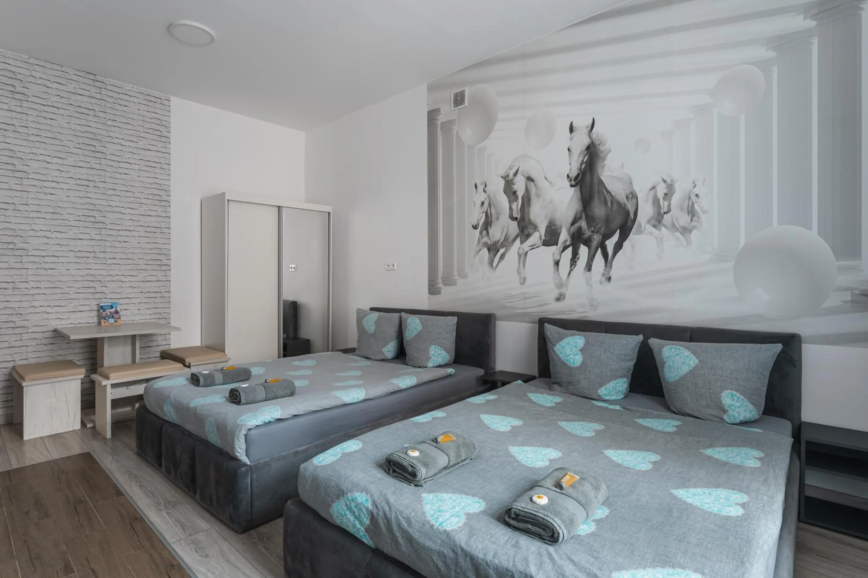 Bed in Queen Apartments