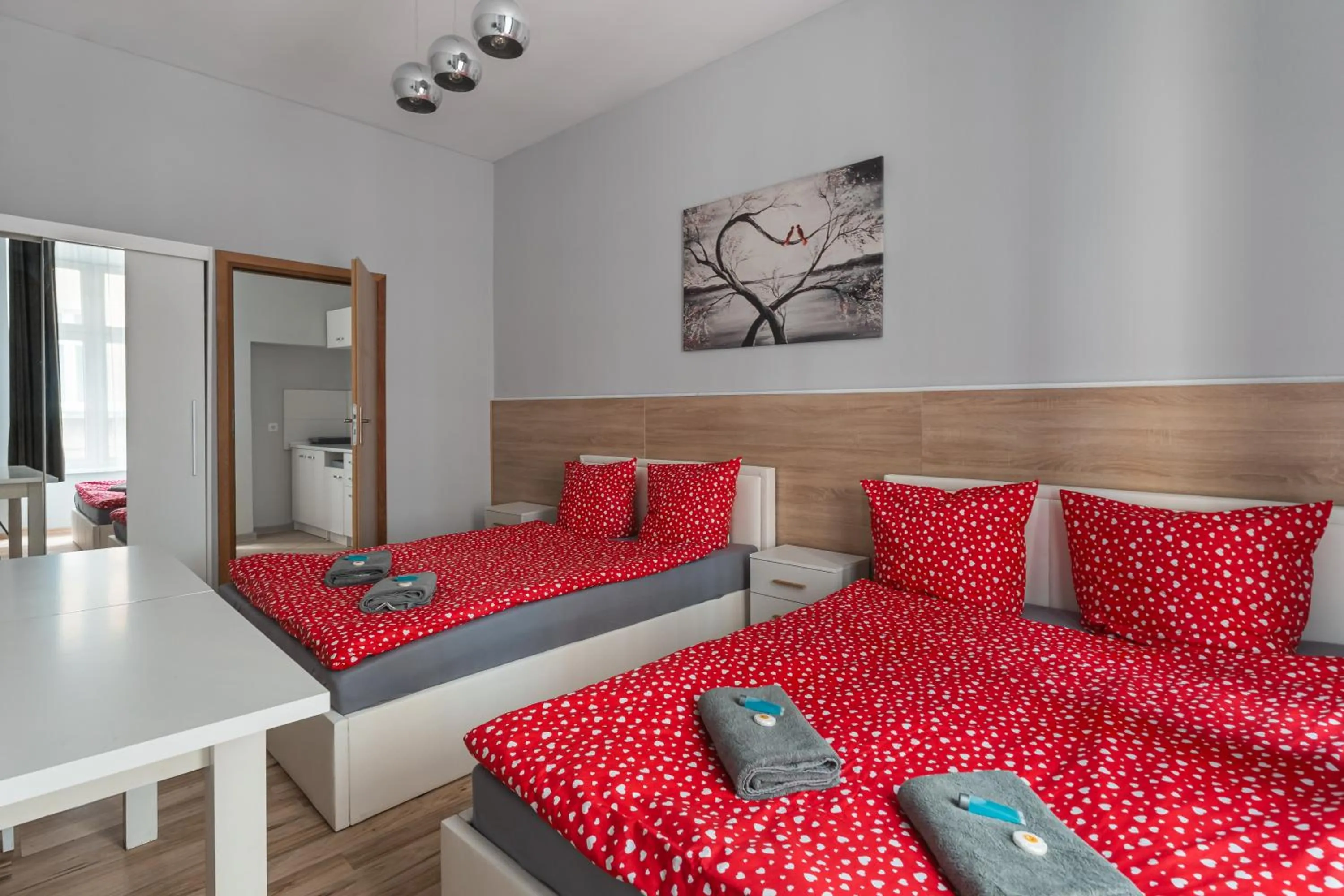 Bed in Queen Apartments