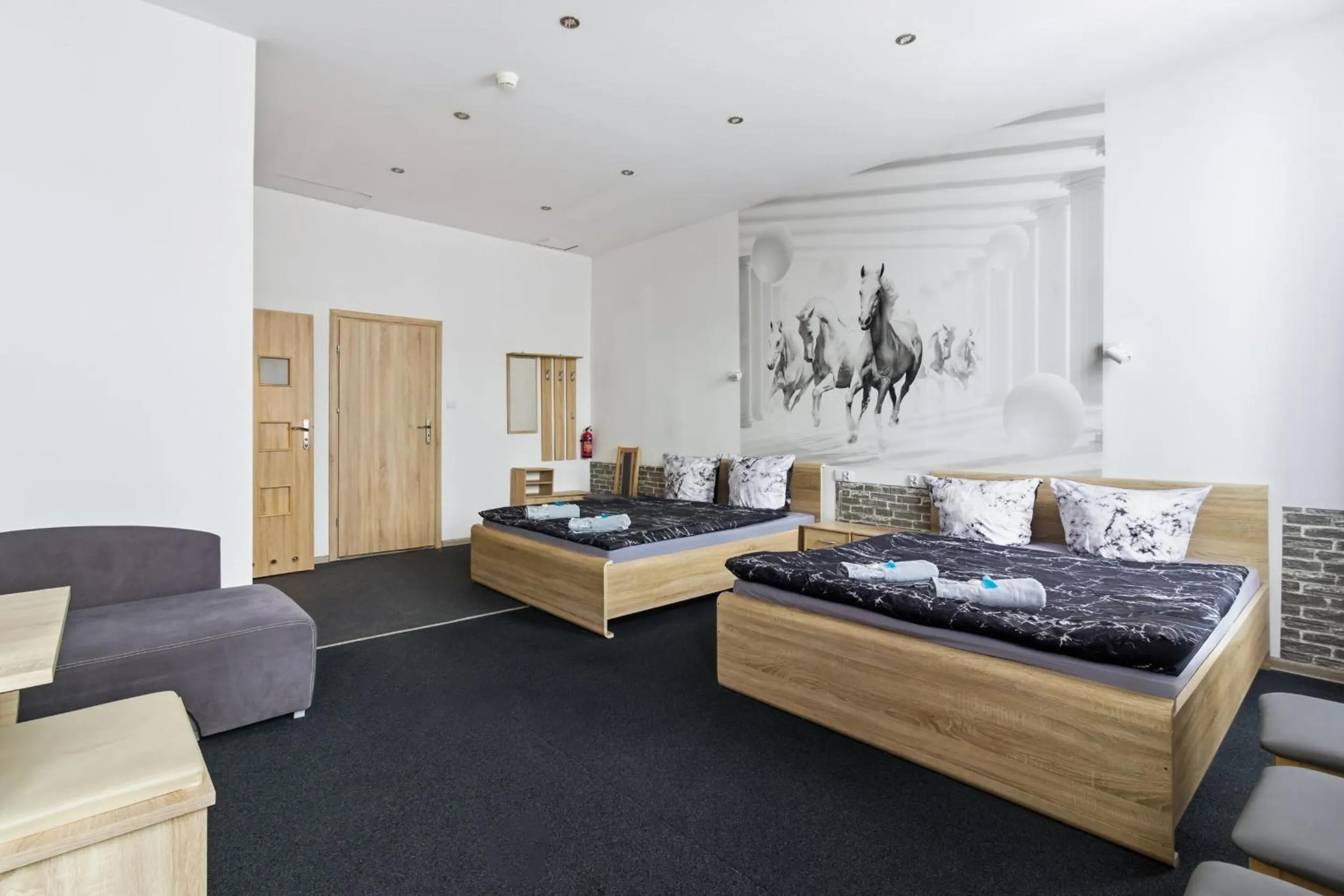 Bed in Queen Apartments