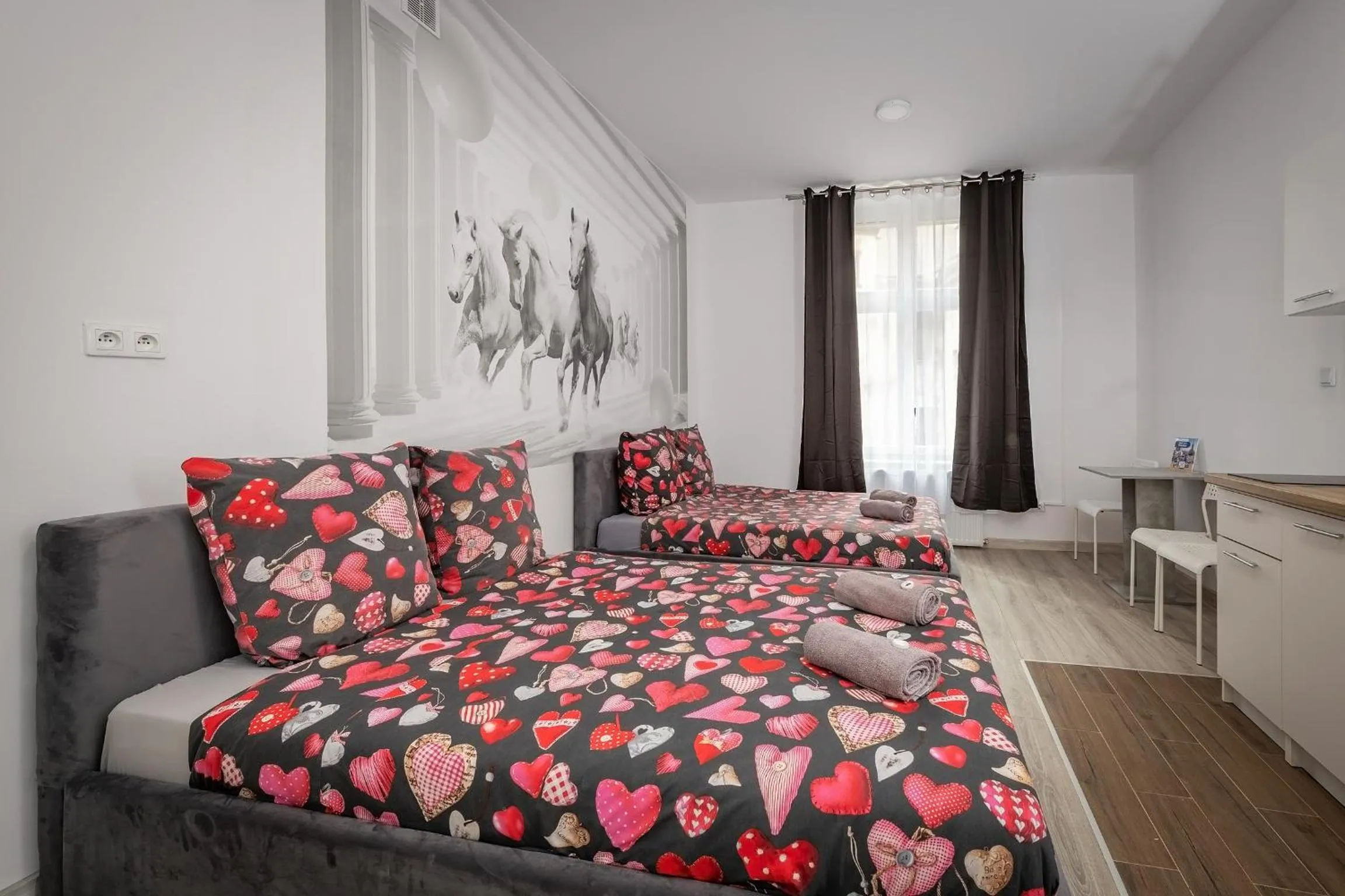 Bed in Queen Apartments