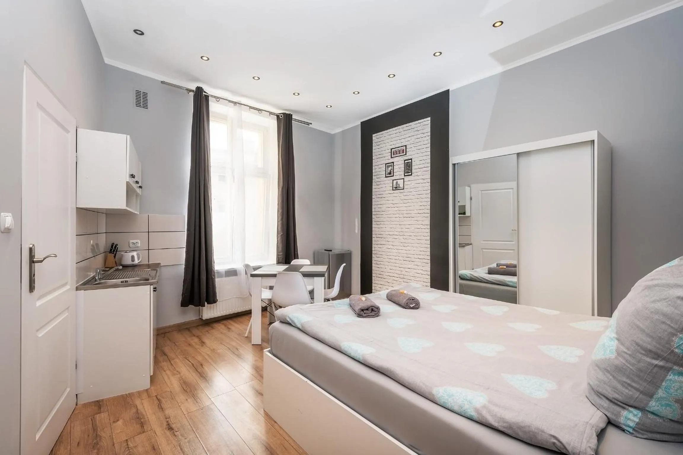 Bed in Queen Apartments