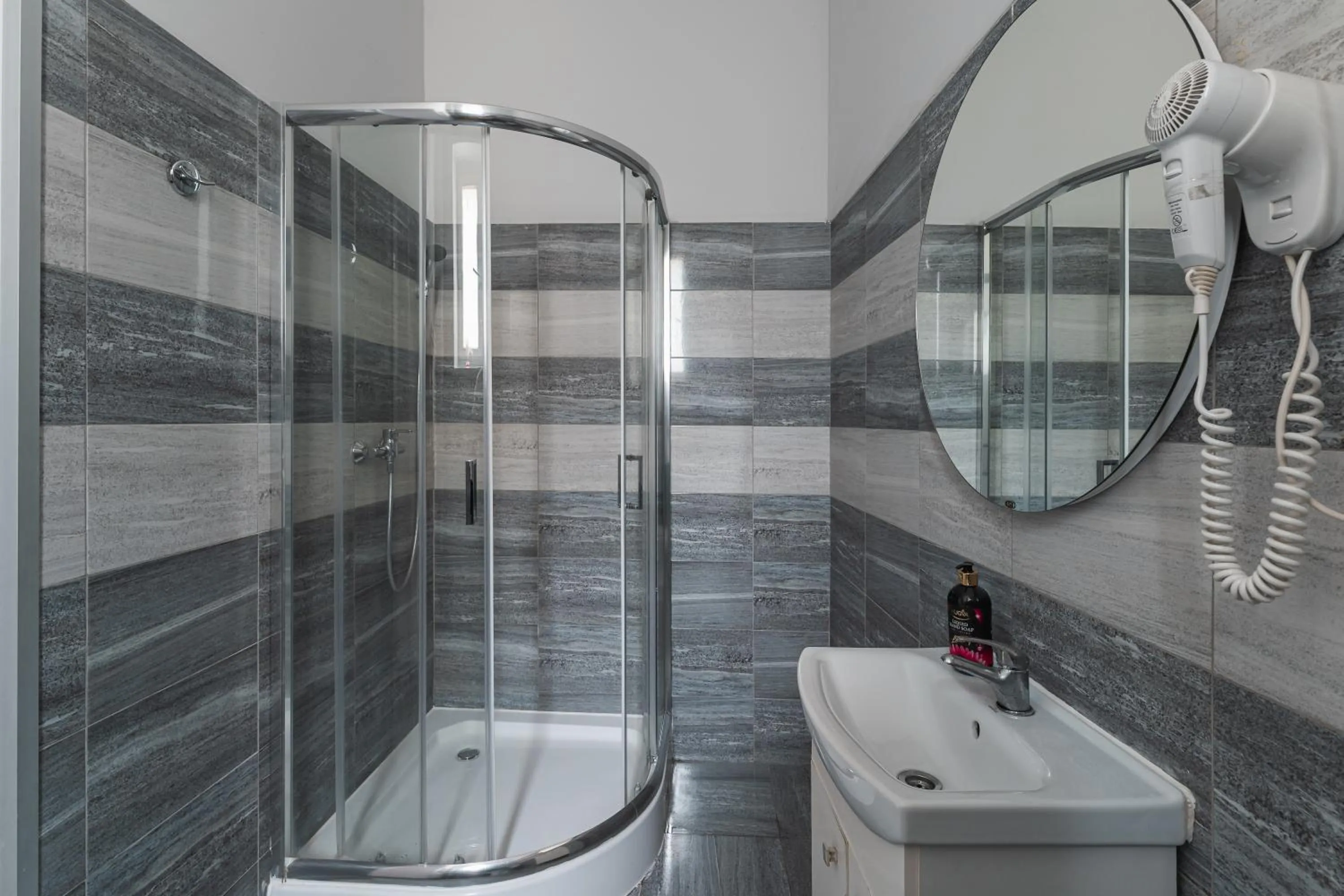 Shower in Queen Apartments