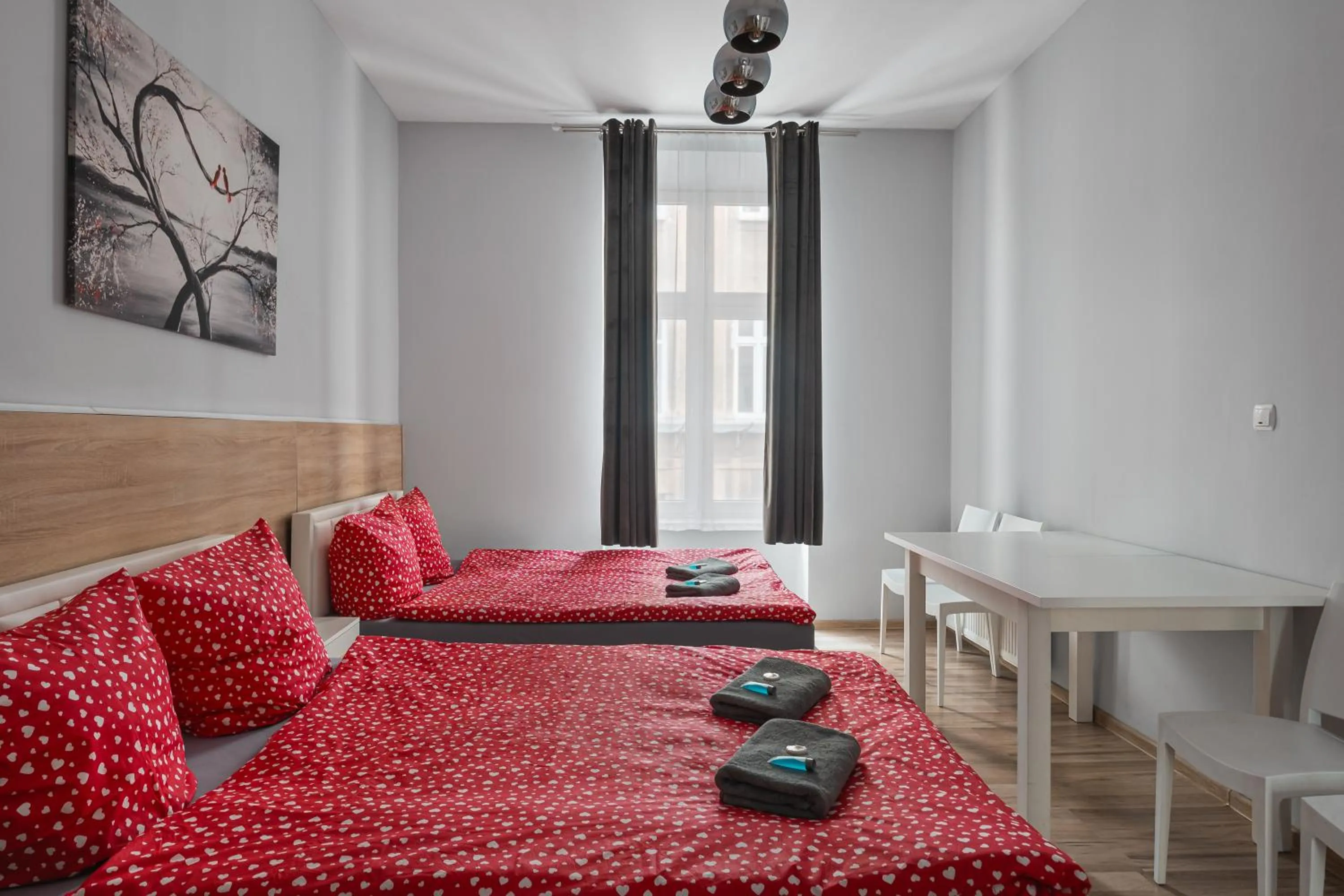 Bed in Queen Apartments