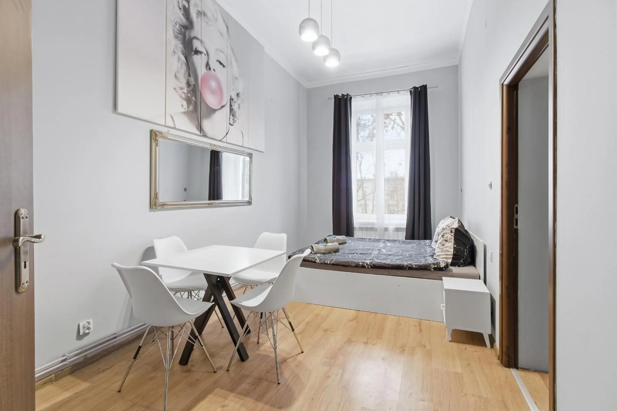 Bed in Queen Apartments