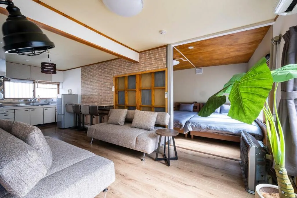 Living room, Bed in YADOt Inn OTARU