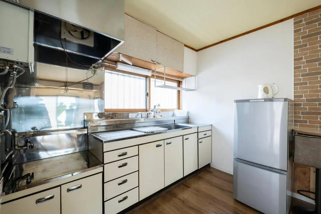 kitchen in YADOt Inn OTARU