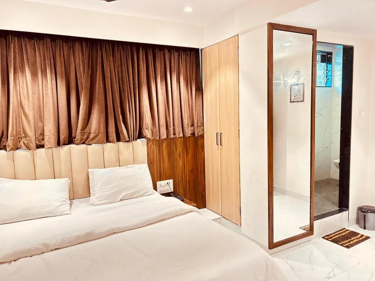 Bed in Prince NX Hotel