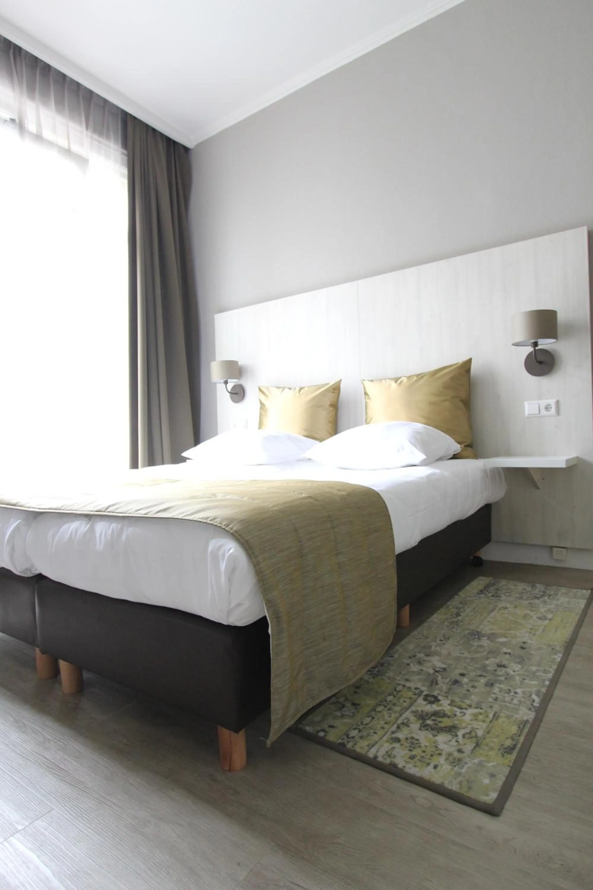 Bed in Apple Inn Hotel