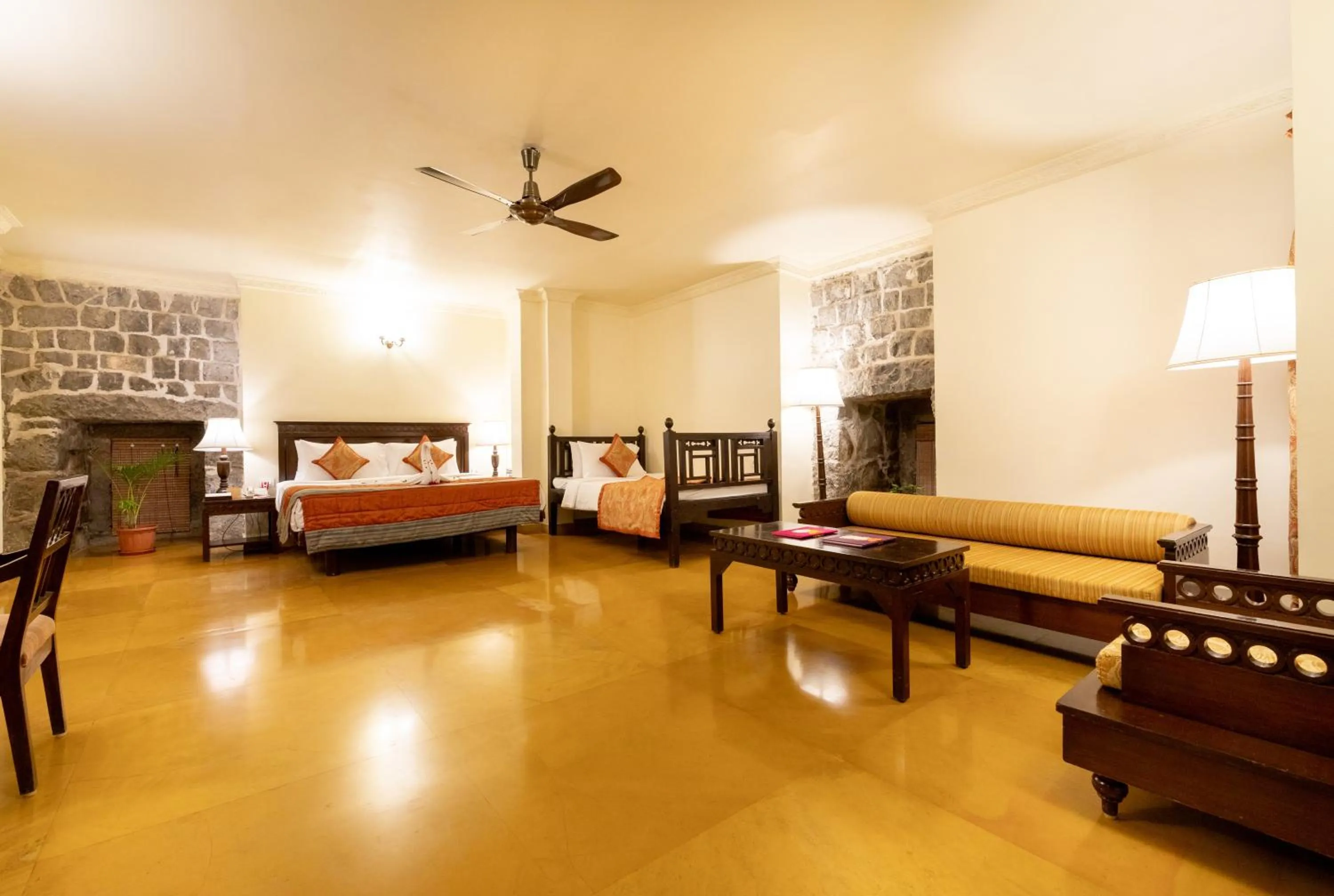 Seating area, Bed in Fort JadhavGADH -A GADH Heritage Hotel