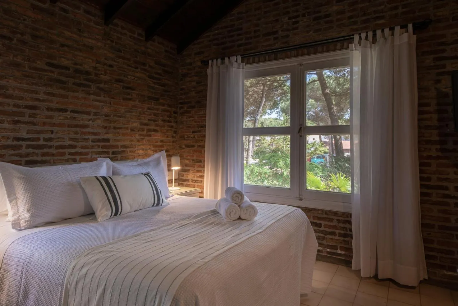 Bed in Carilo Village Apart Hotel & Spa