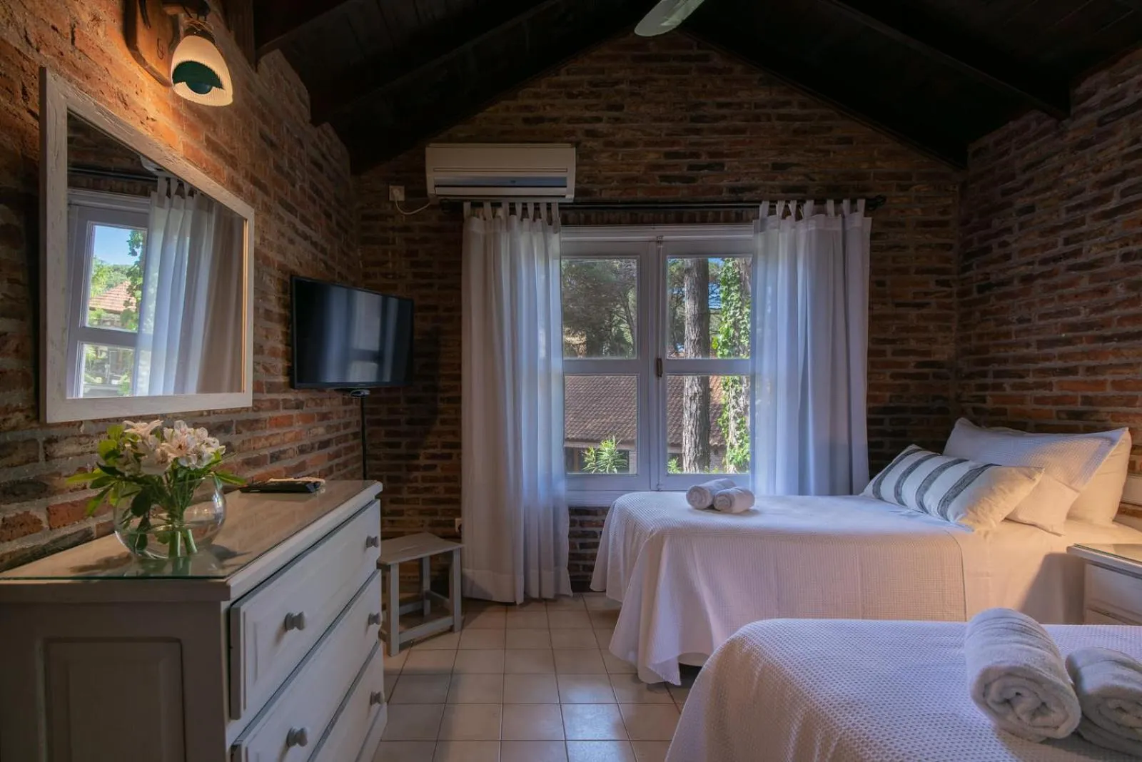 Bed in Carilo Village Apart Hotel & Spa