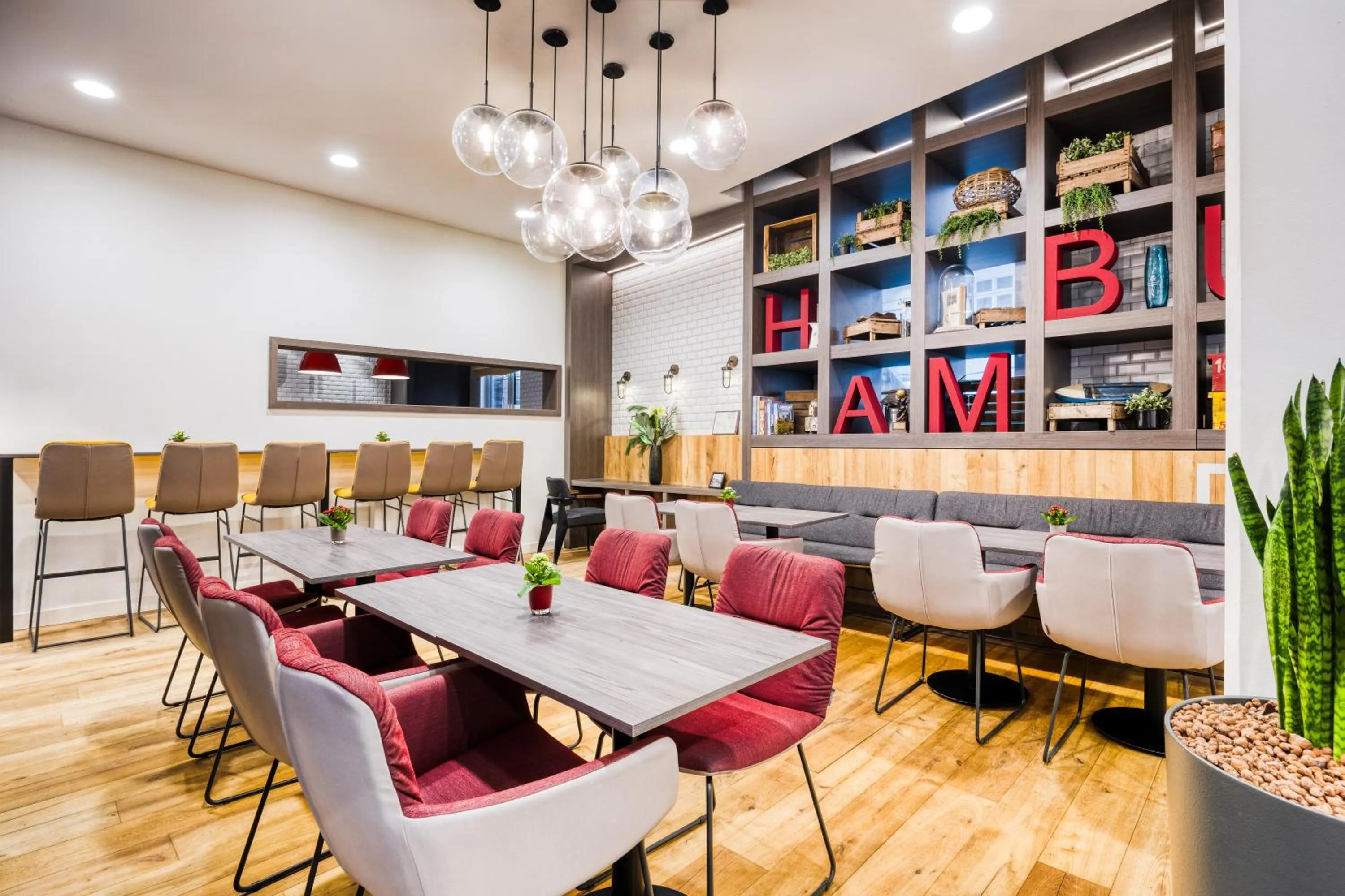 Communal lounge/ TV room in Citadines Michel Hamburg