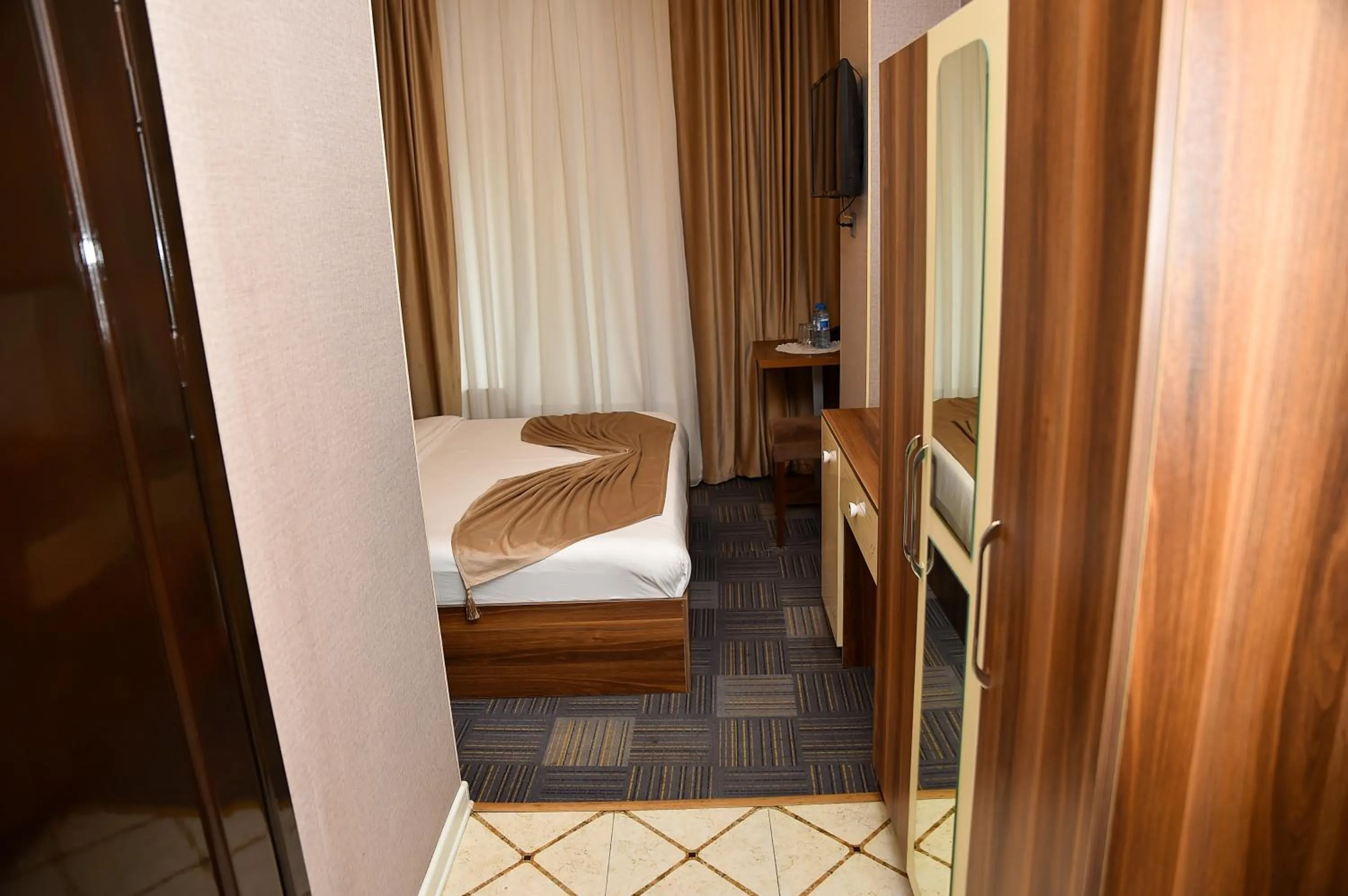 Bed in Boulevard Rigs Boutique Hotel