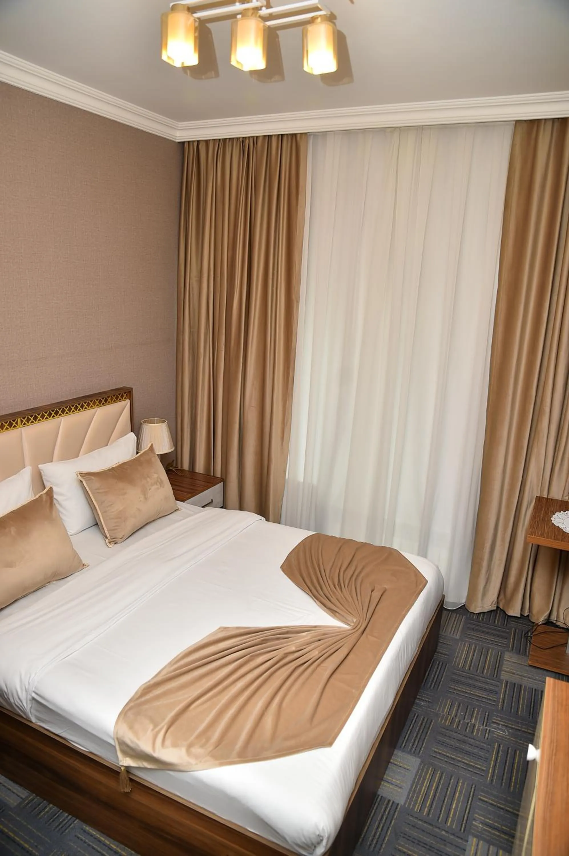 Bed in Boulevard Rigs Boutique Hotel