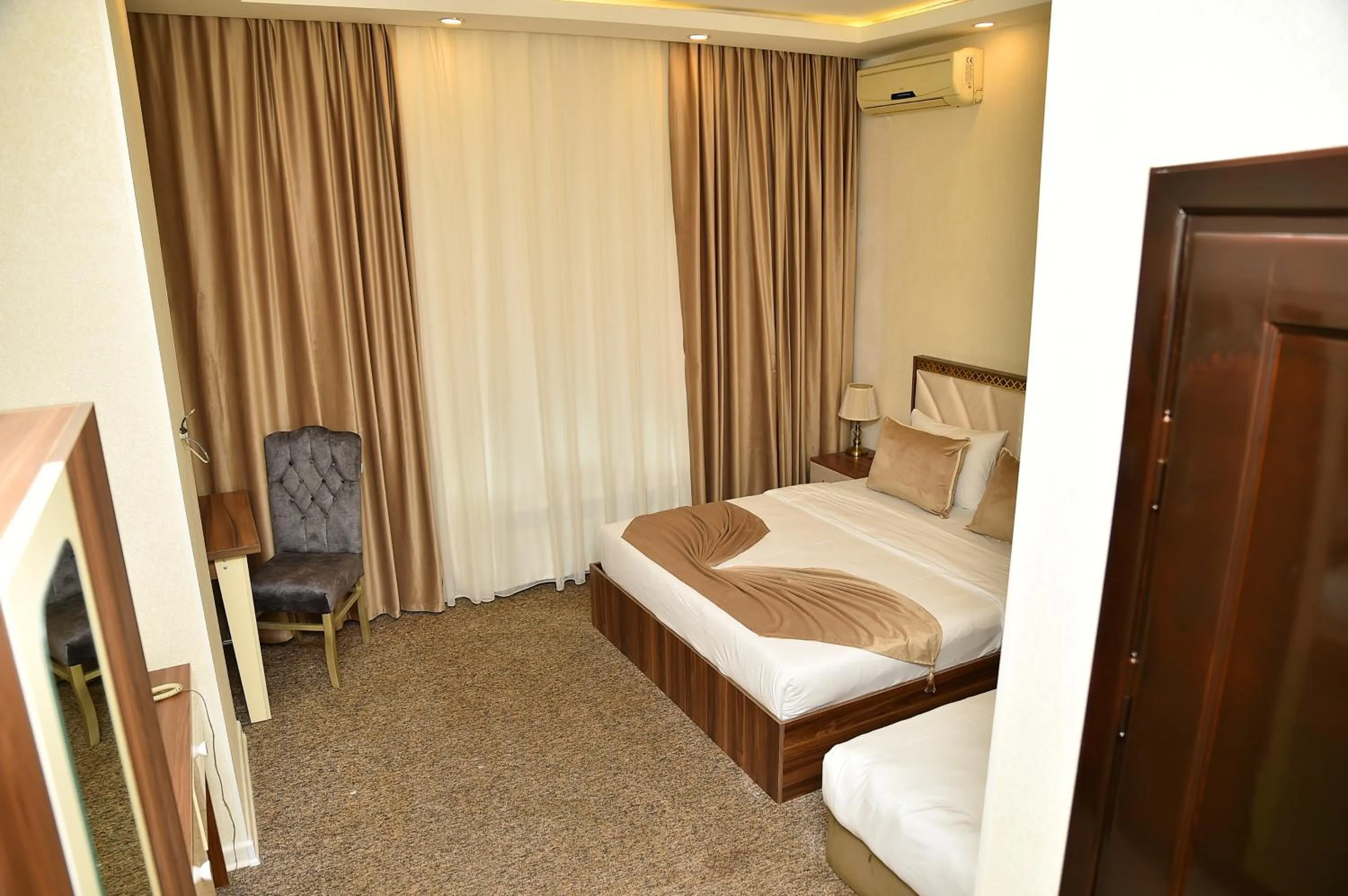 Bed in Boulevard Rigs Boutique Hotel