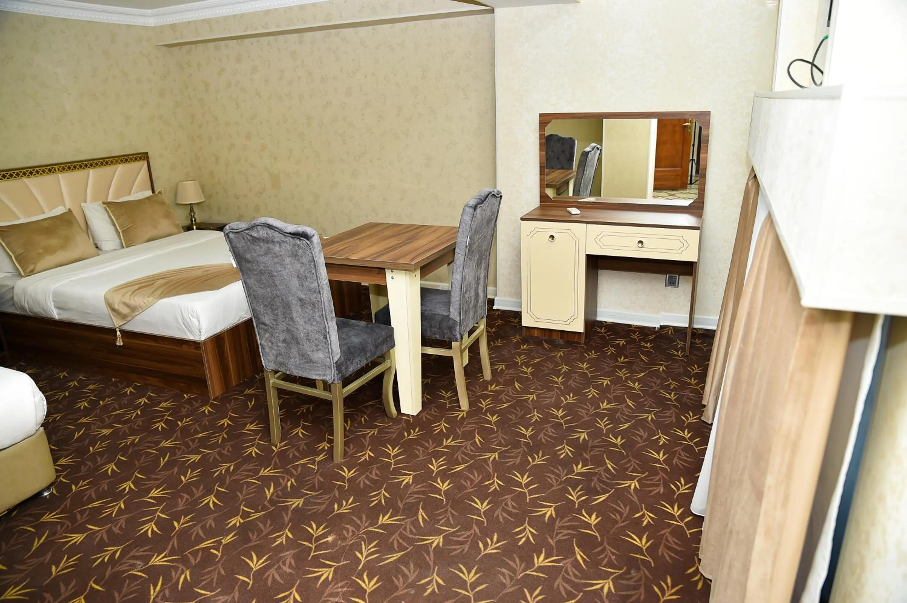 Bed in Boulevard Rigs Boutique Hotel